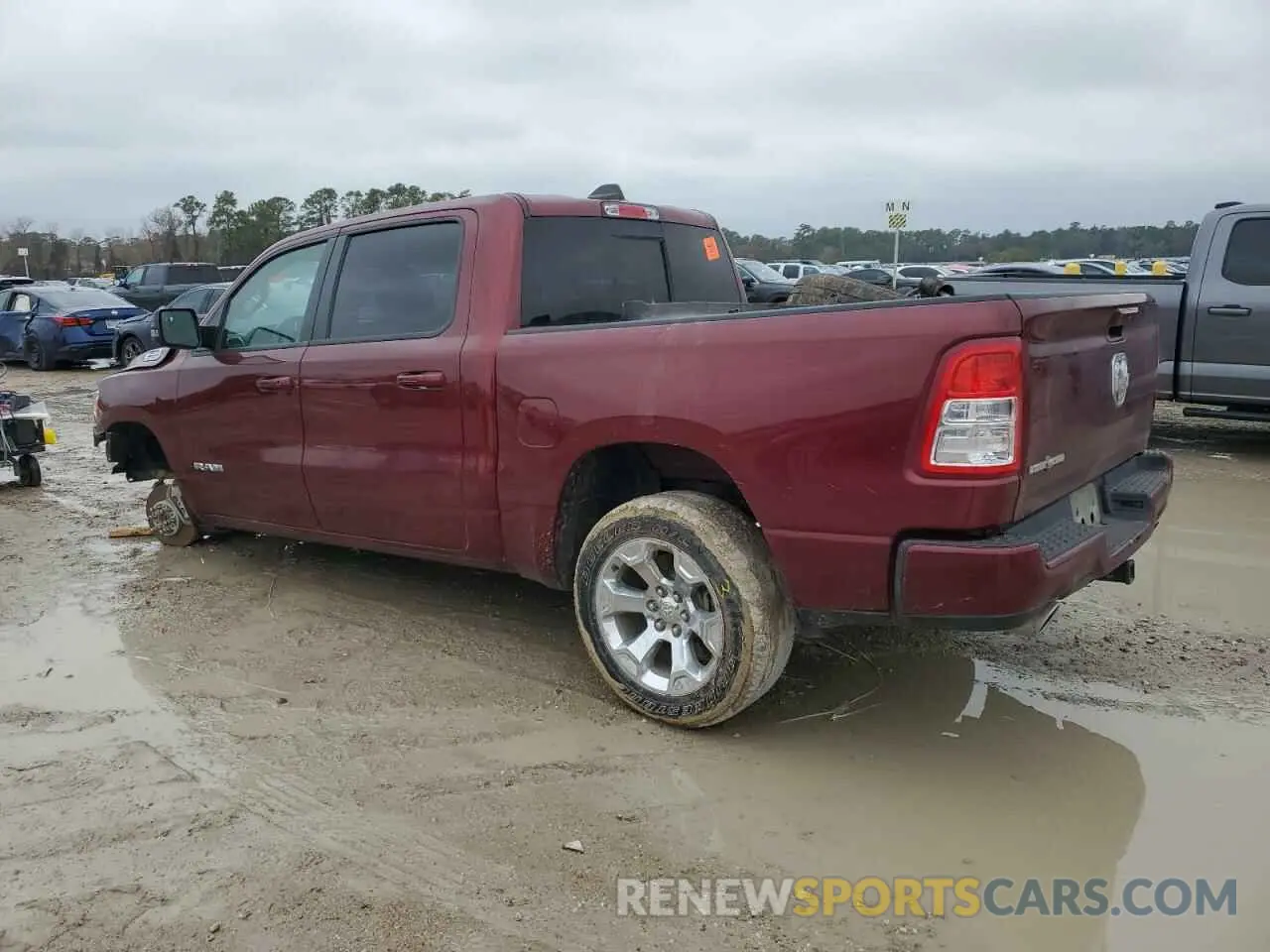 2 Photograph of a damaged car 1C6RREFTXRN157702 RAM 1500 2024