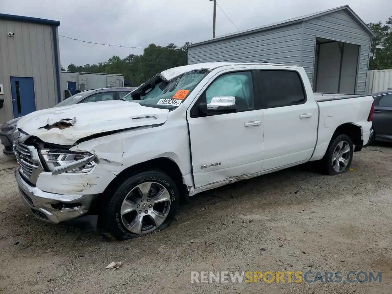 1 Photograph of a damaged car 1C6RREJT7RN219967 RAM 1500 2024