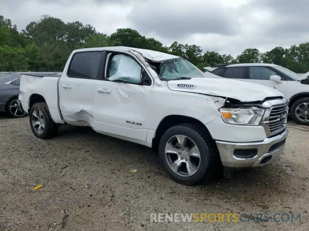 4 Photograph of a damaged car 1C6RREJT7RN219967 RAM 1500 2024