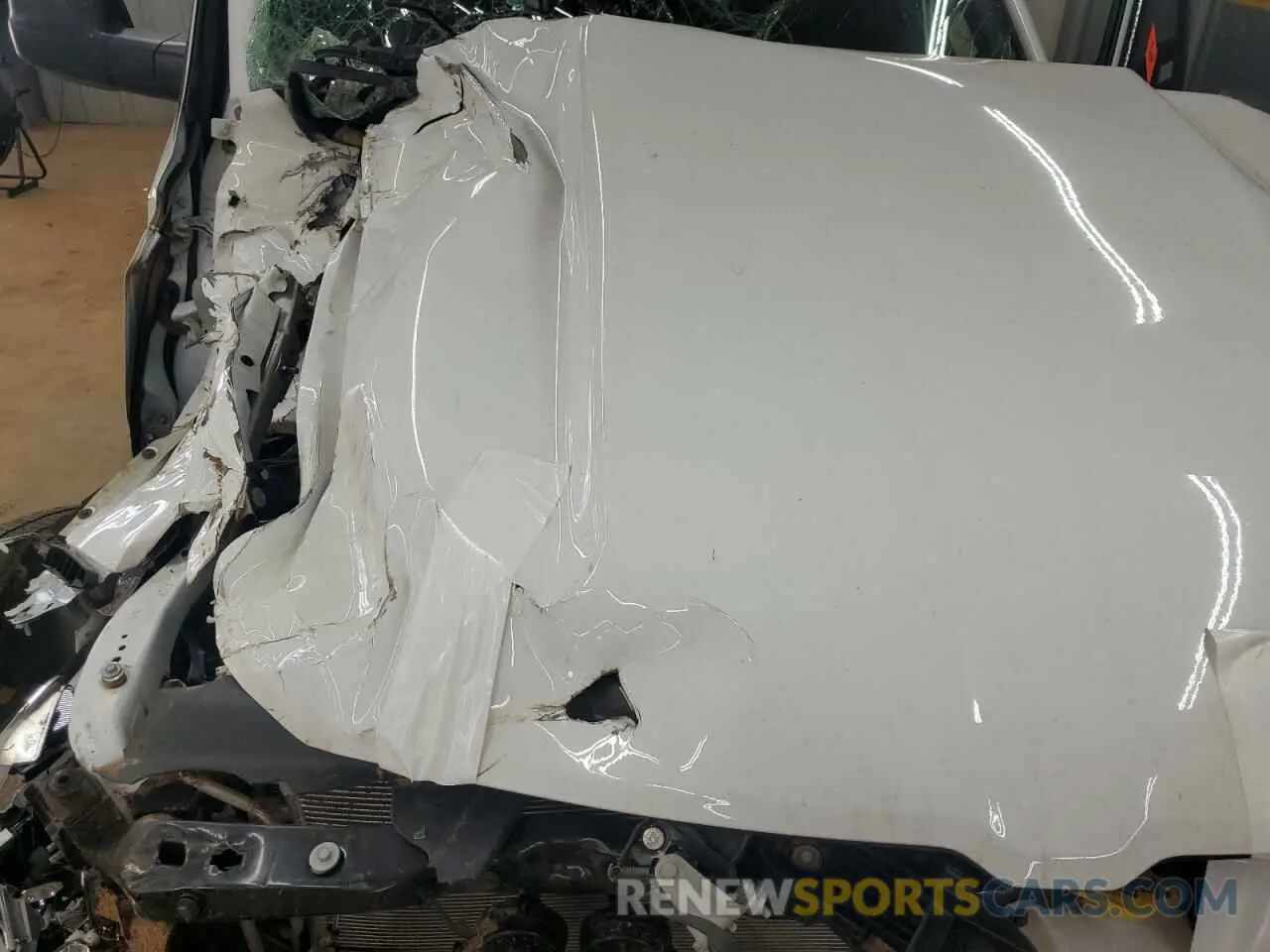 11 Photograph of a damaged car 1C6SRECG1RN221103 RAM 1500 2024