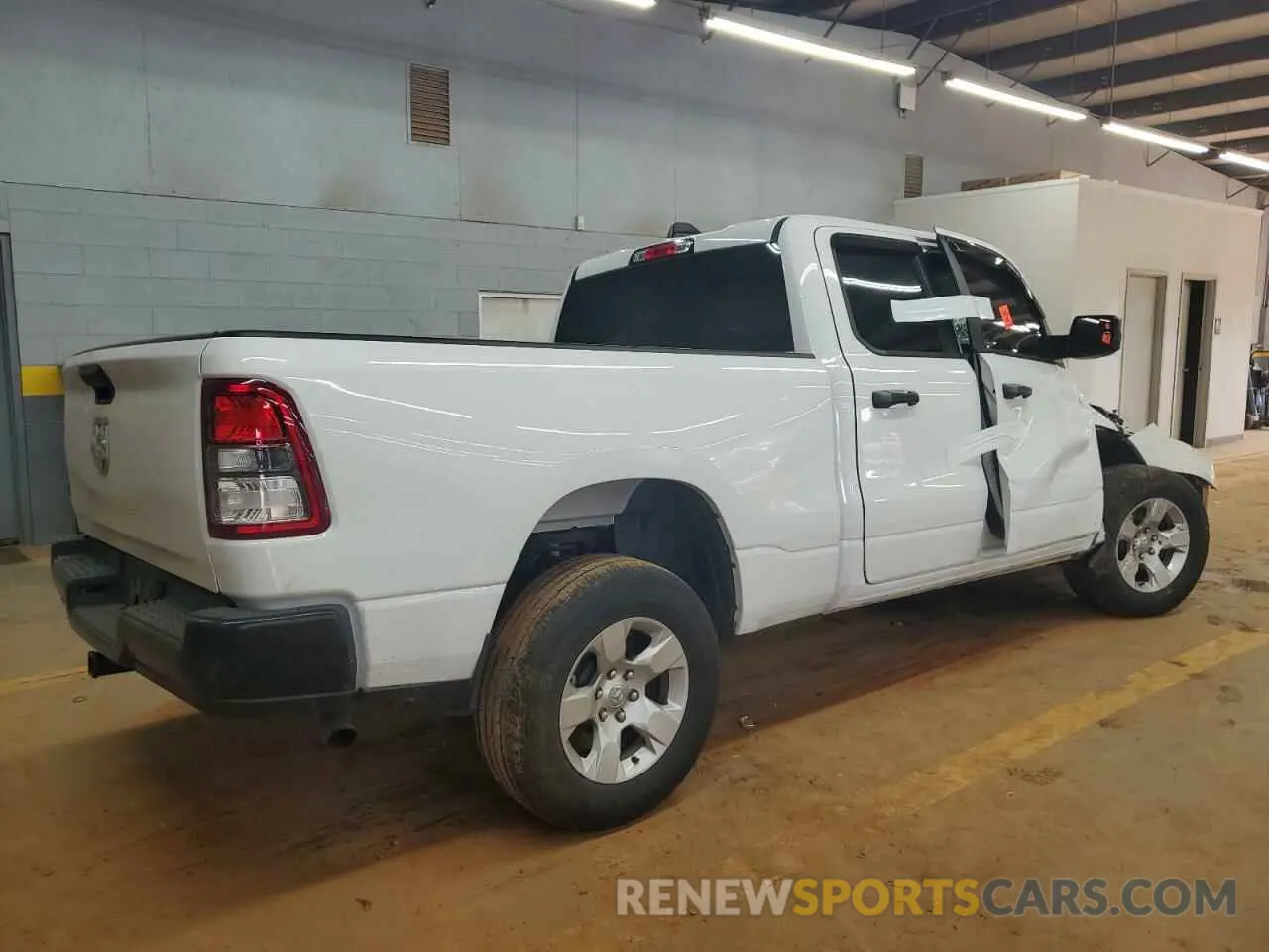 3 Photograph of a damaged car 1C6SRECG1RN221103 RAM 1500 2024