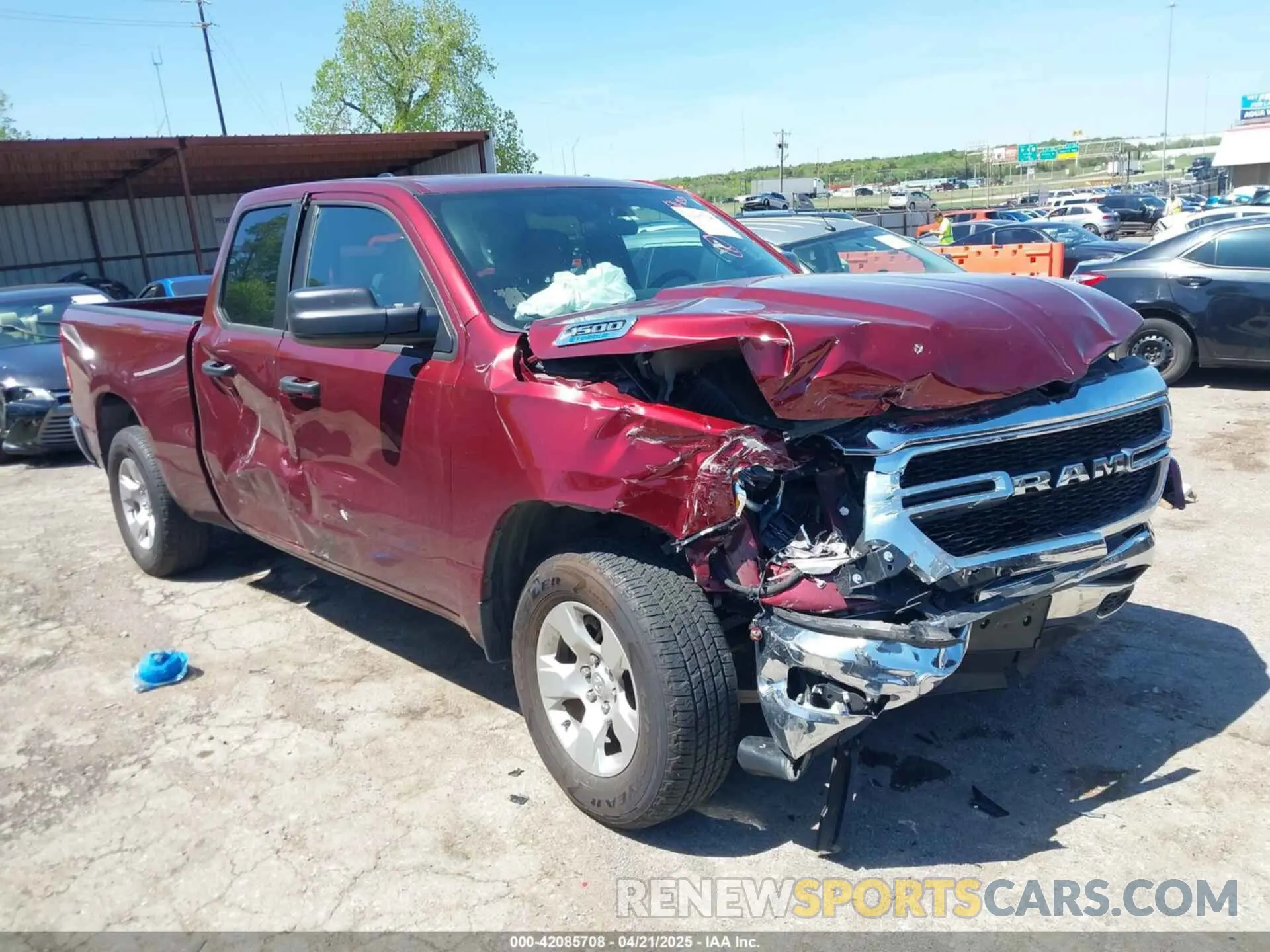 14 Photograph of a damaged car 1C6SRECG5RN205714 RAM 1500 2024