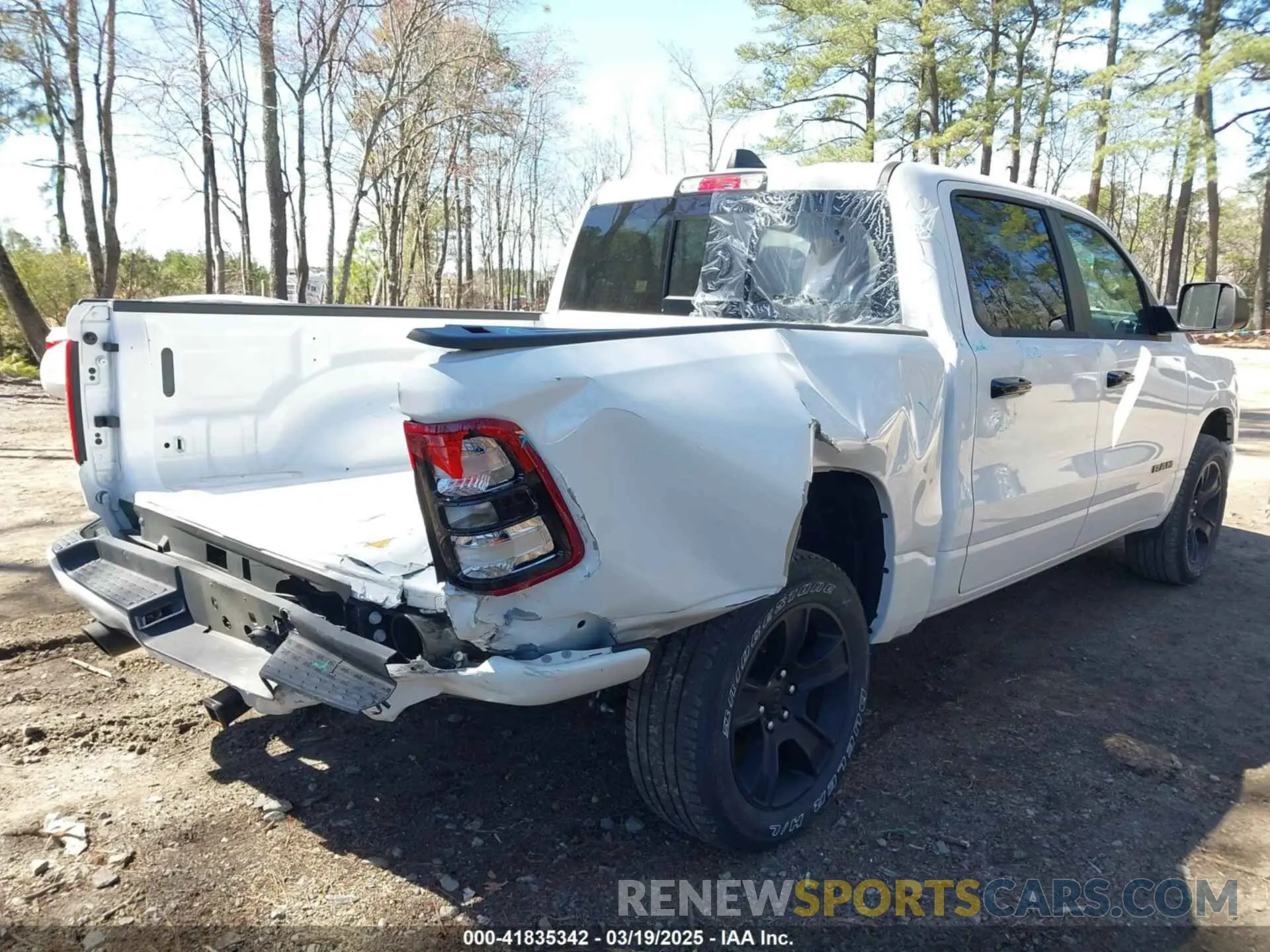 4 Photograph of a damaged car 1C6SRFFT0RN150670 RAM 1500 2024