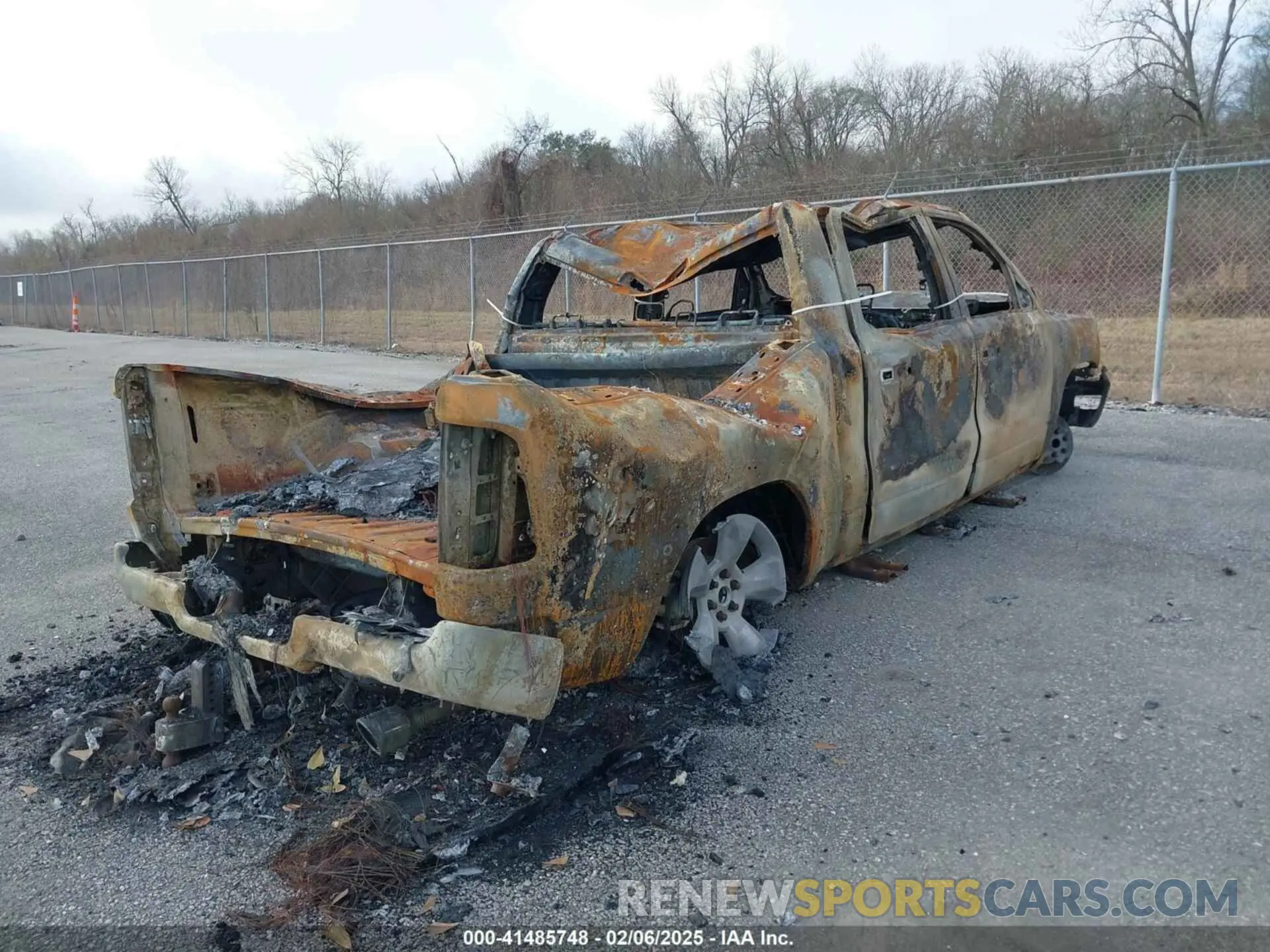 4 Photograph of a damaged car 1C6SRFFT3RN232330 RAM 1500 2024