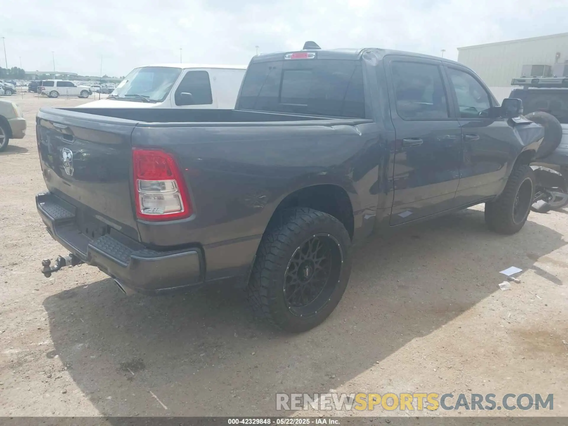 4 Photograph of a damaged car 1C6SRFFT5RN184572 RAM 1500 2024