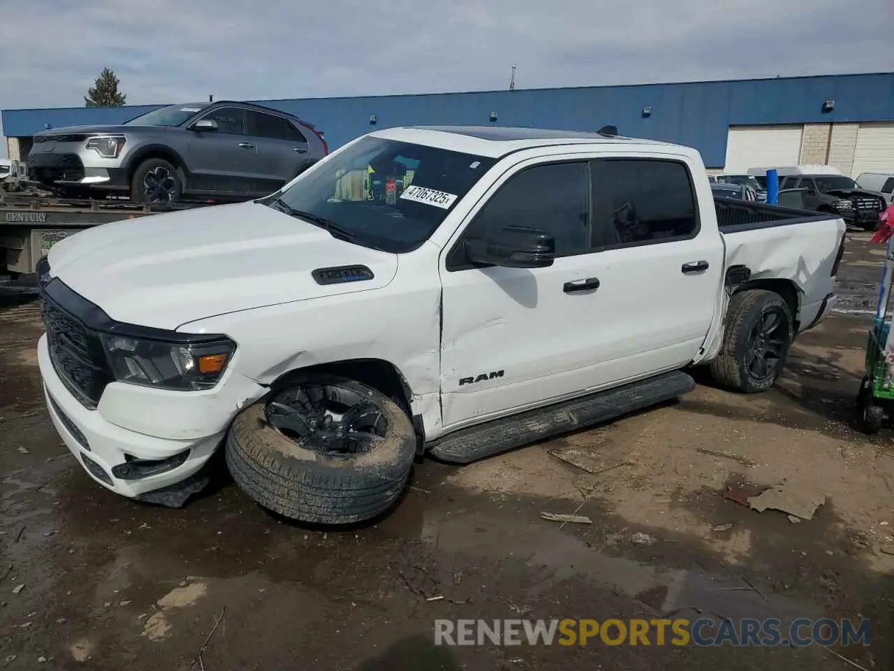 1 Photograph of a damaged car 1C6SRFFT6RN112862 RAM 1500 2024