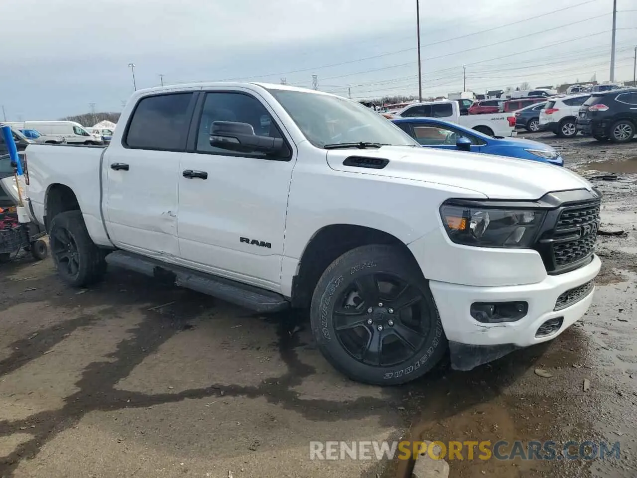 4 Photograph of a damaged car 1C6SRFFT6RN112862 RAM 1500 2024