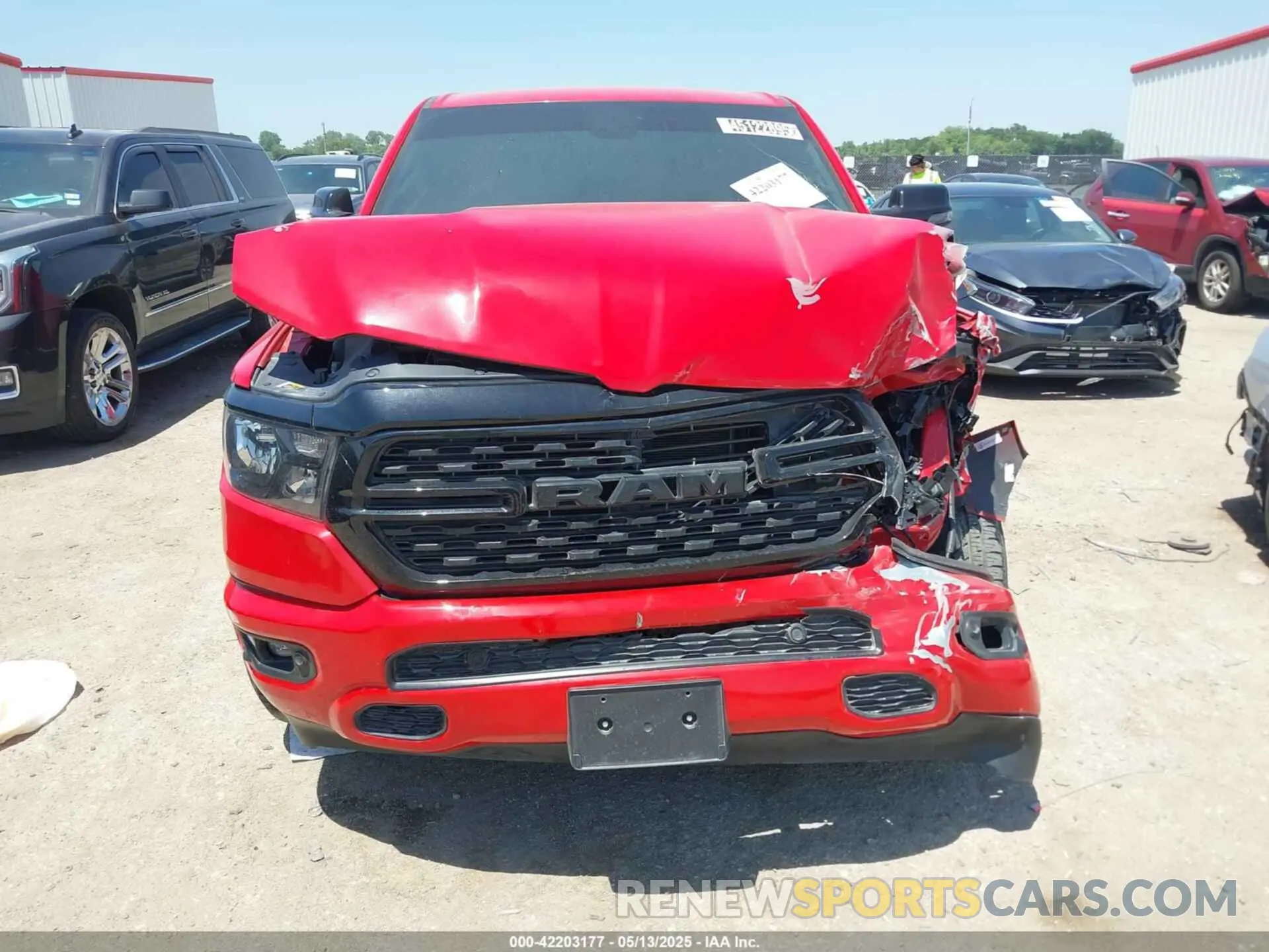 13 Photograph of a damaged car 1C6SRFFT6RN202805 RAM 1500 2024