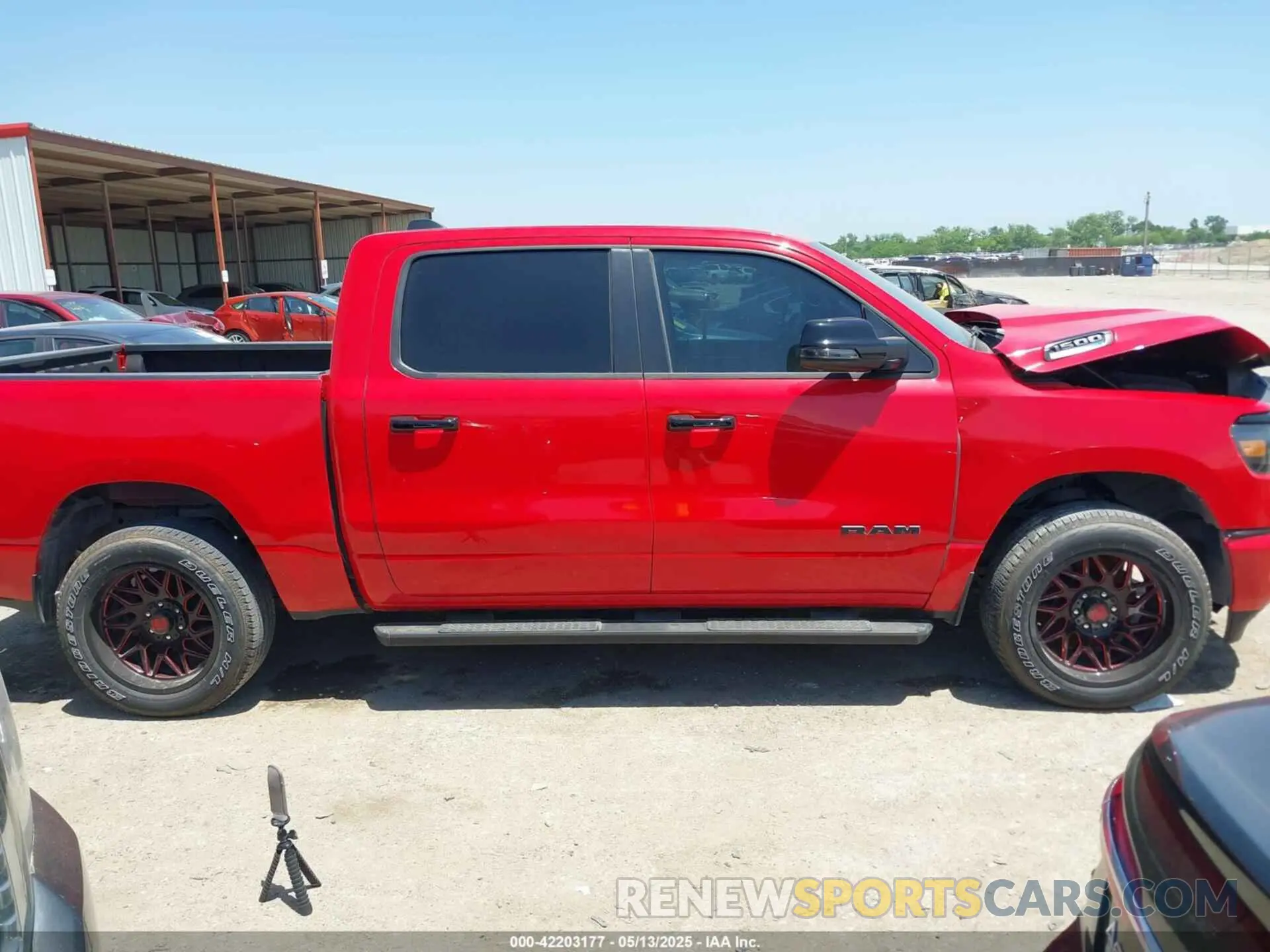14 Photograph of a damaged car 1C6SRFFT6RN202805 RAM 1500 2024