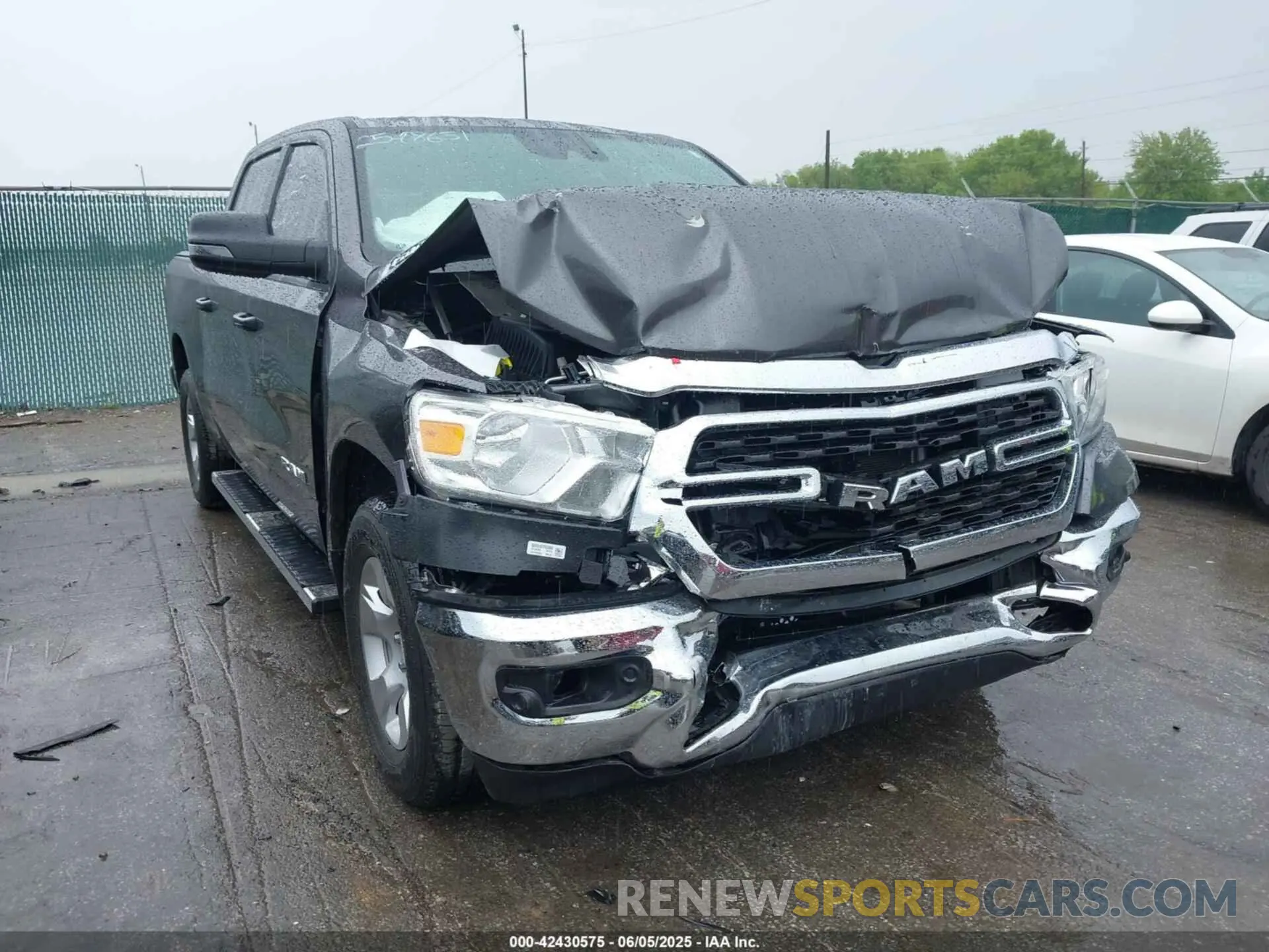 1 Photograph of a damaged car 1C6SRFFT8RN165305 RAM 1500 2024