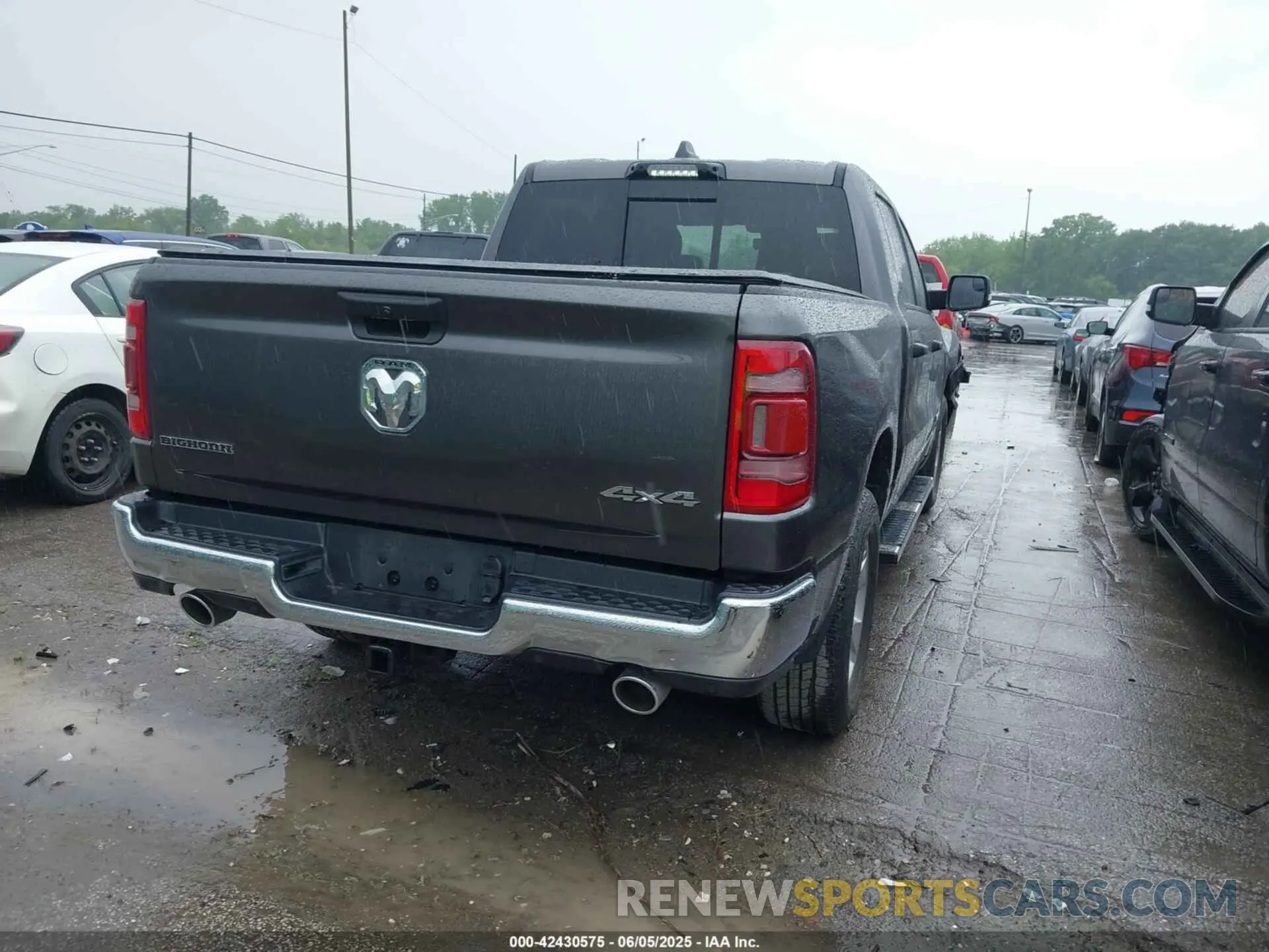 4 Photograph of a damaged car 1C6SRFFT8RN165305 RAM 1500 2024
