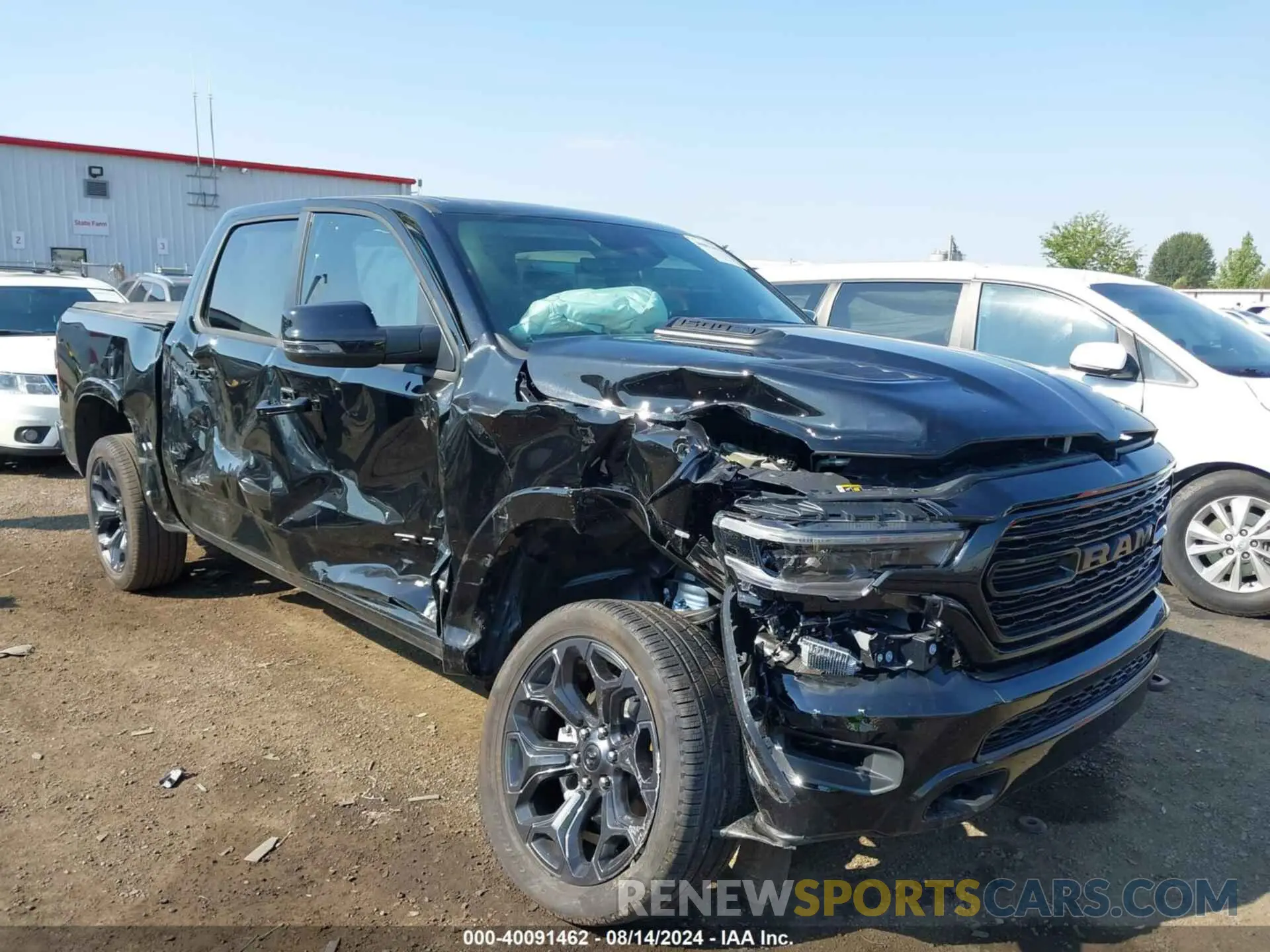 1 Photograph of a damaged car 1C6SRFHT2RN182419 RAM 1500 2024