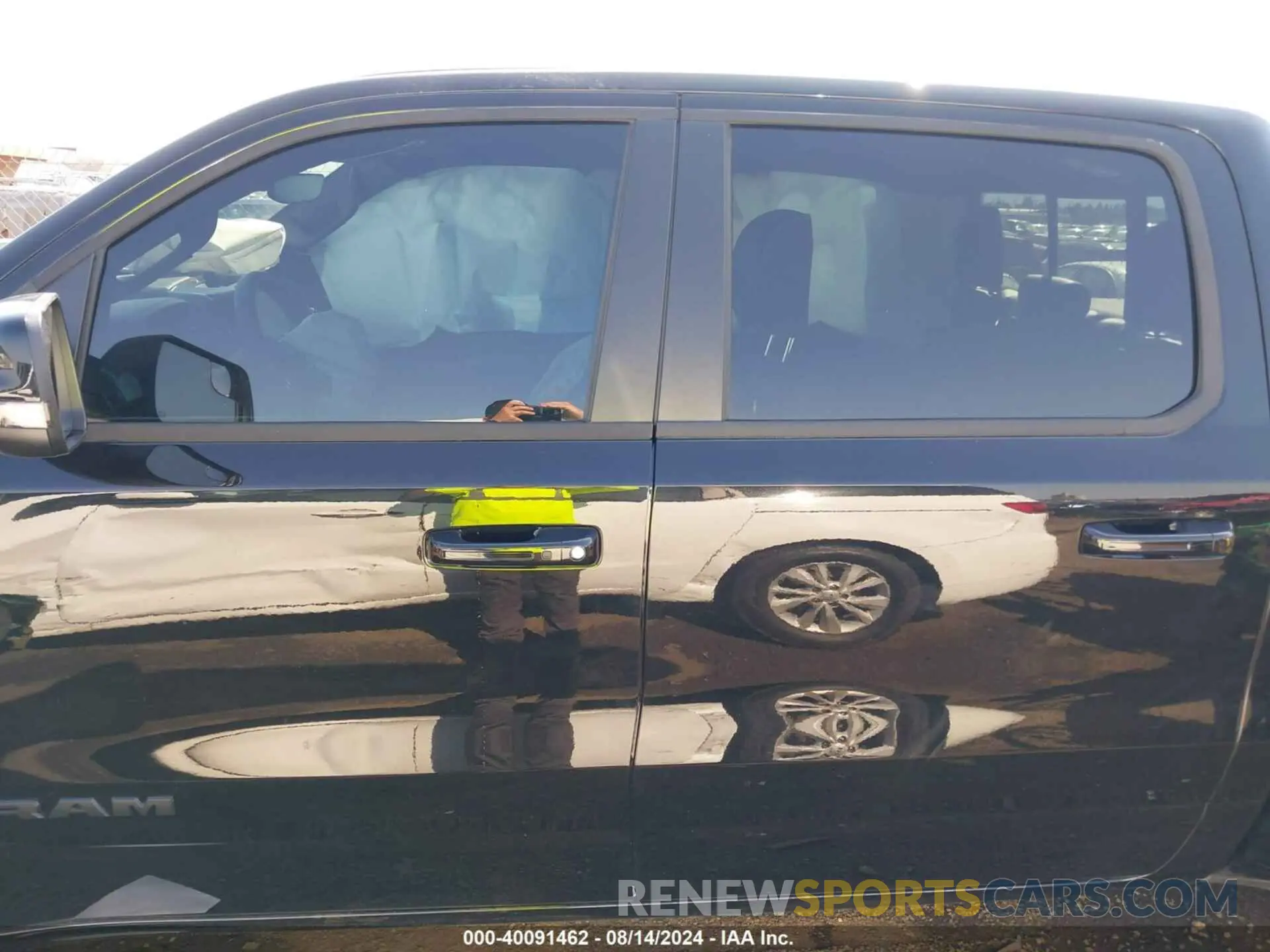 14 Photograph of a damaged car 1C6SRFHT2RN182419 RAM 1500 2024