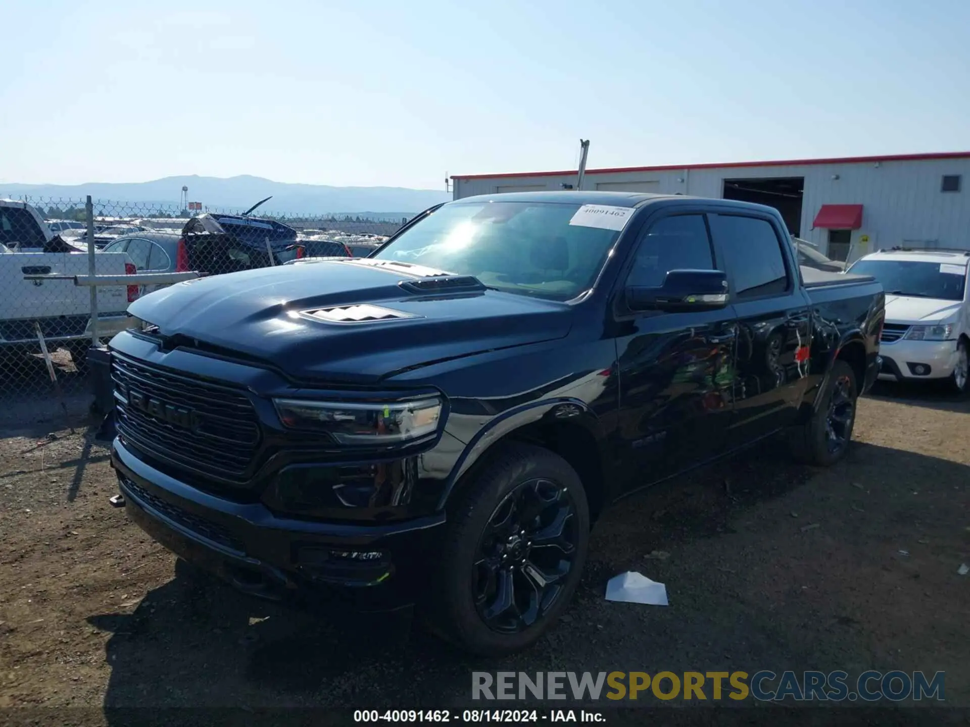 2 Photograph of a damaged car 1C6SRFHT2RN182419 RAM 1500 2024