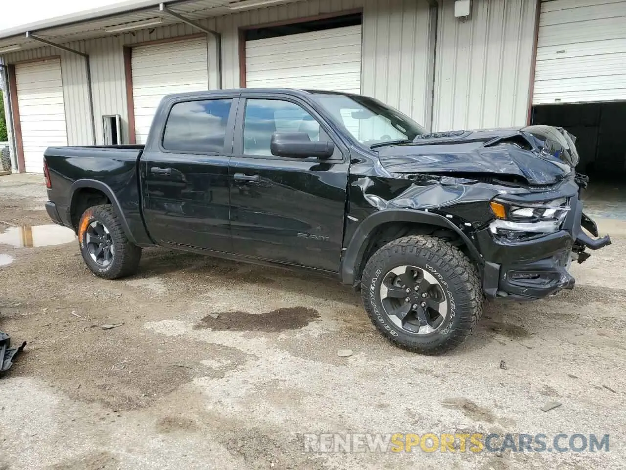 4 Photograph of a damaged car 1C6SRFLT0RN162662 RAM 1500 2024