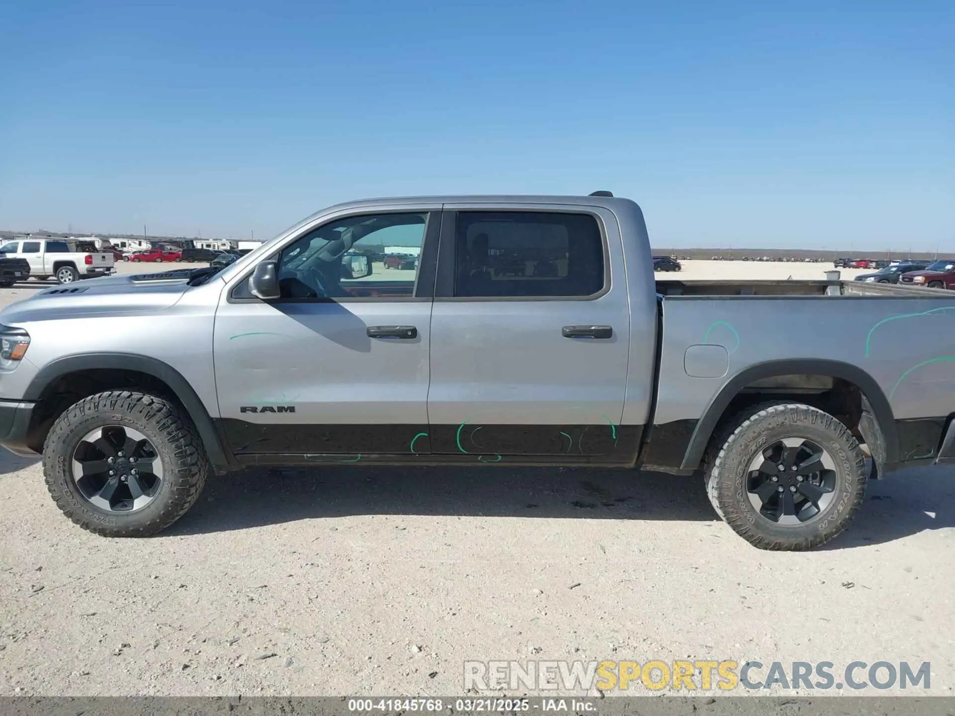 14 Photograph of a damaged car 1C6SRFLT0RN223654 RAM 1500 2024