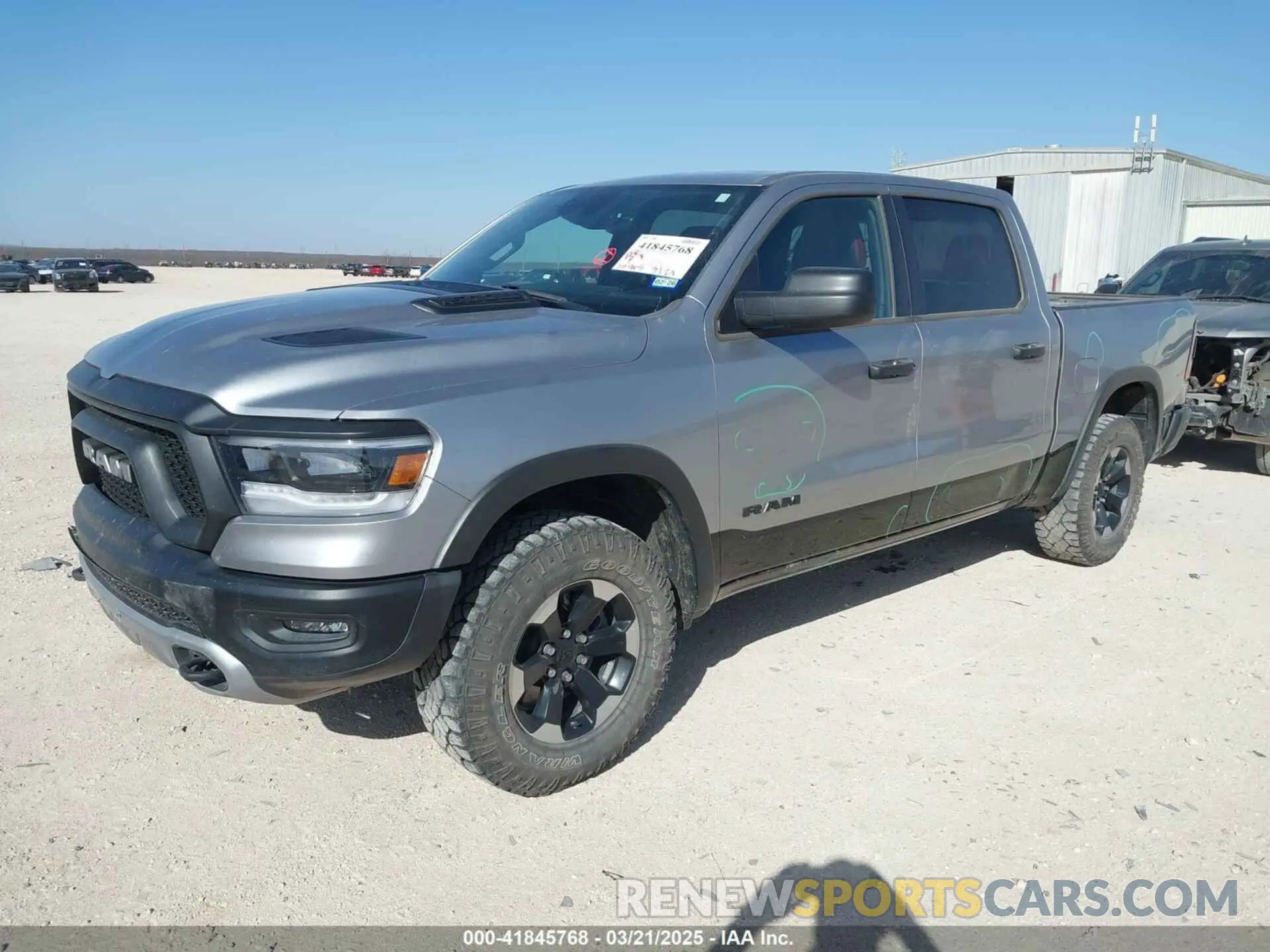 2 Photograph of a damaged car 1C6SRFLT0RN223654 RAM 1500 2024