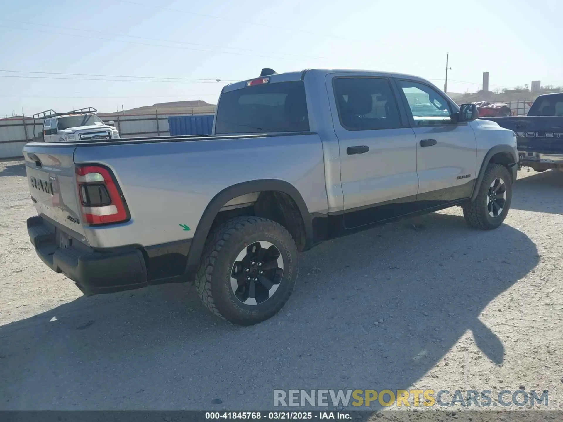 4 Photograph of a damaged car 1C6SRFLT0RN223654 RAM 1500 2024