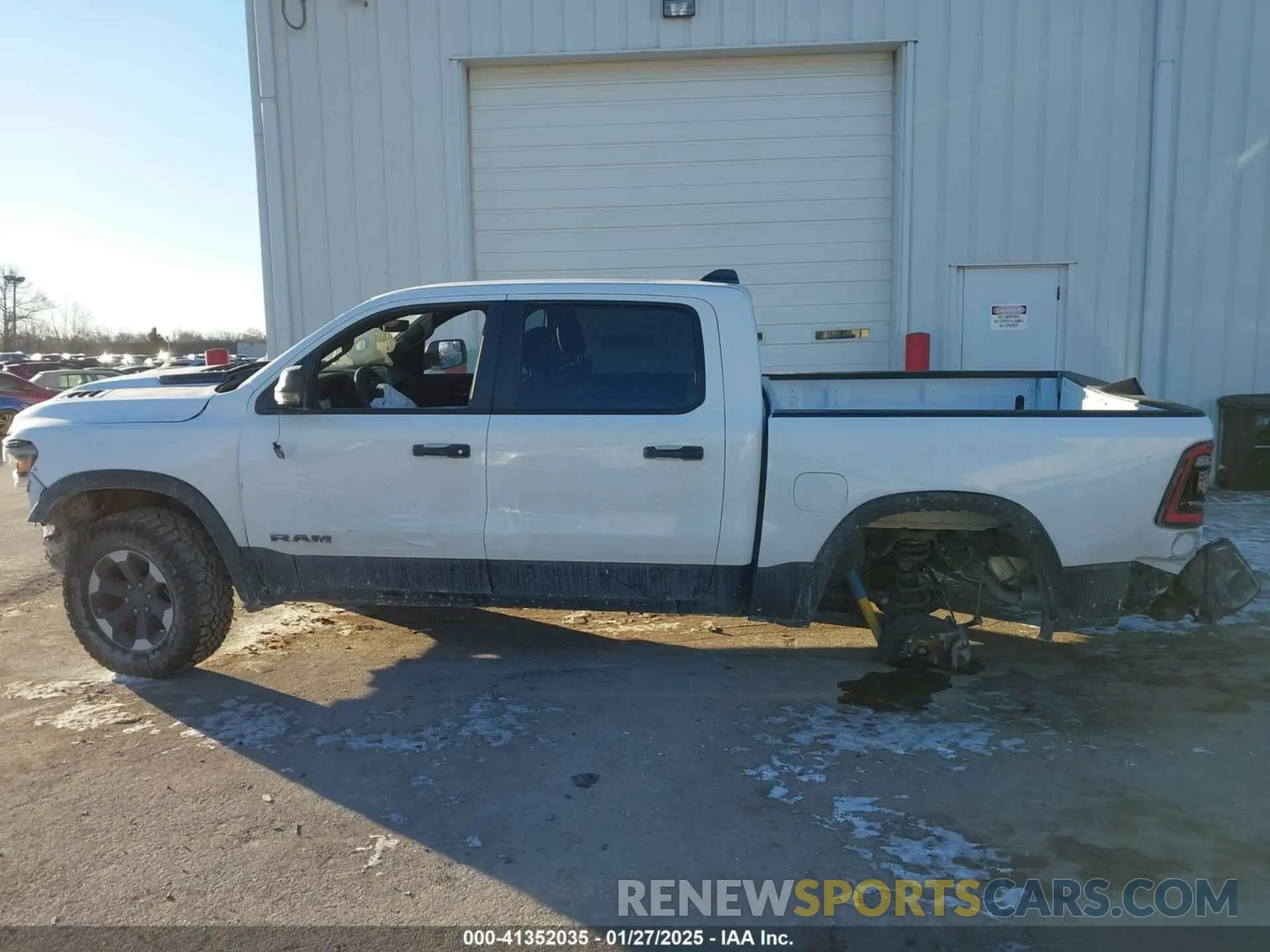 14 Photograph of a damaged car 1C6SRFLT9RN119776 RAM 1500 2024