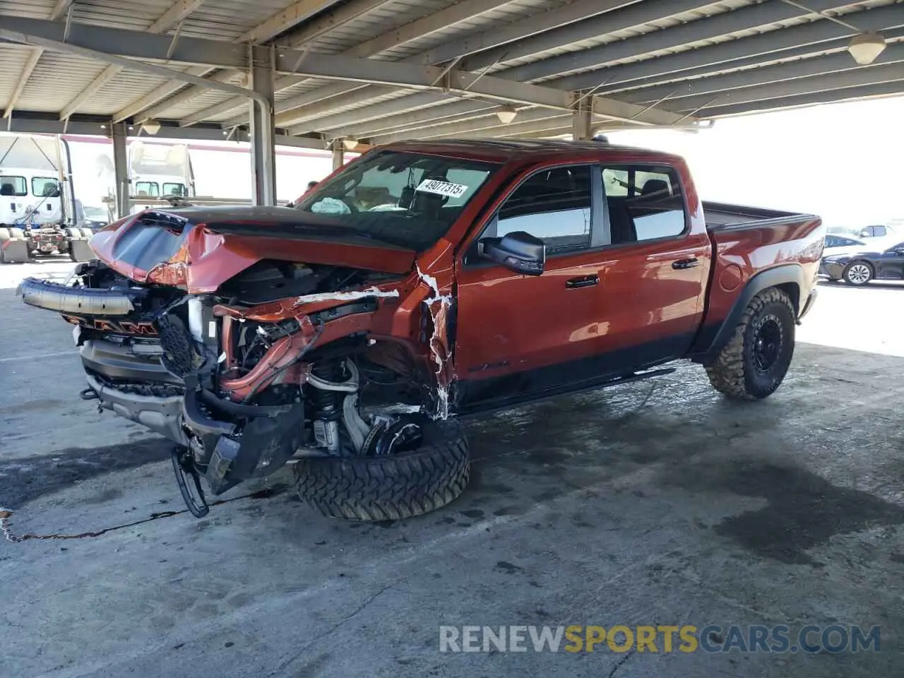 1 Photograph of a damaged car 1C6SRFU95RN223121 RAM 1500 2024