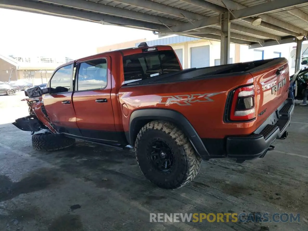 2 Photograph of a damaged car 1C6SRFU95RN223121 RAM 1500 2024