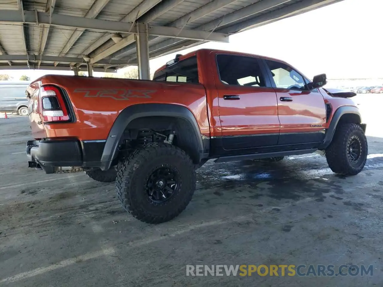 3 Photograph of a damaged car 1C6SRFU95RN223121 RAM 1500 2024
