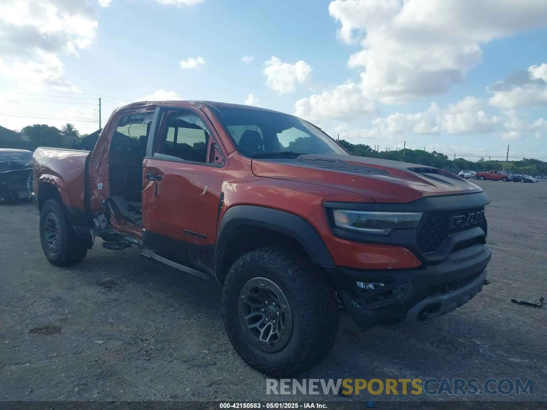 1 Photograph of a damaged car 1C6SRFU98RN223288 RAM 1500 2024
