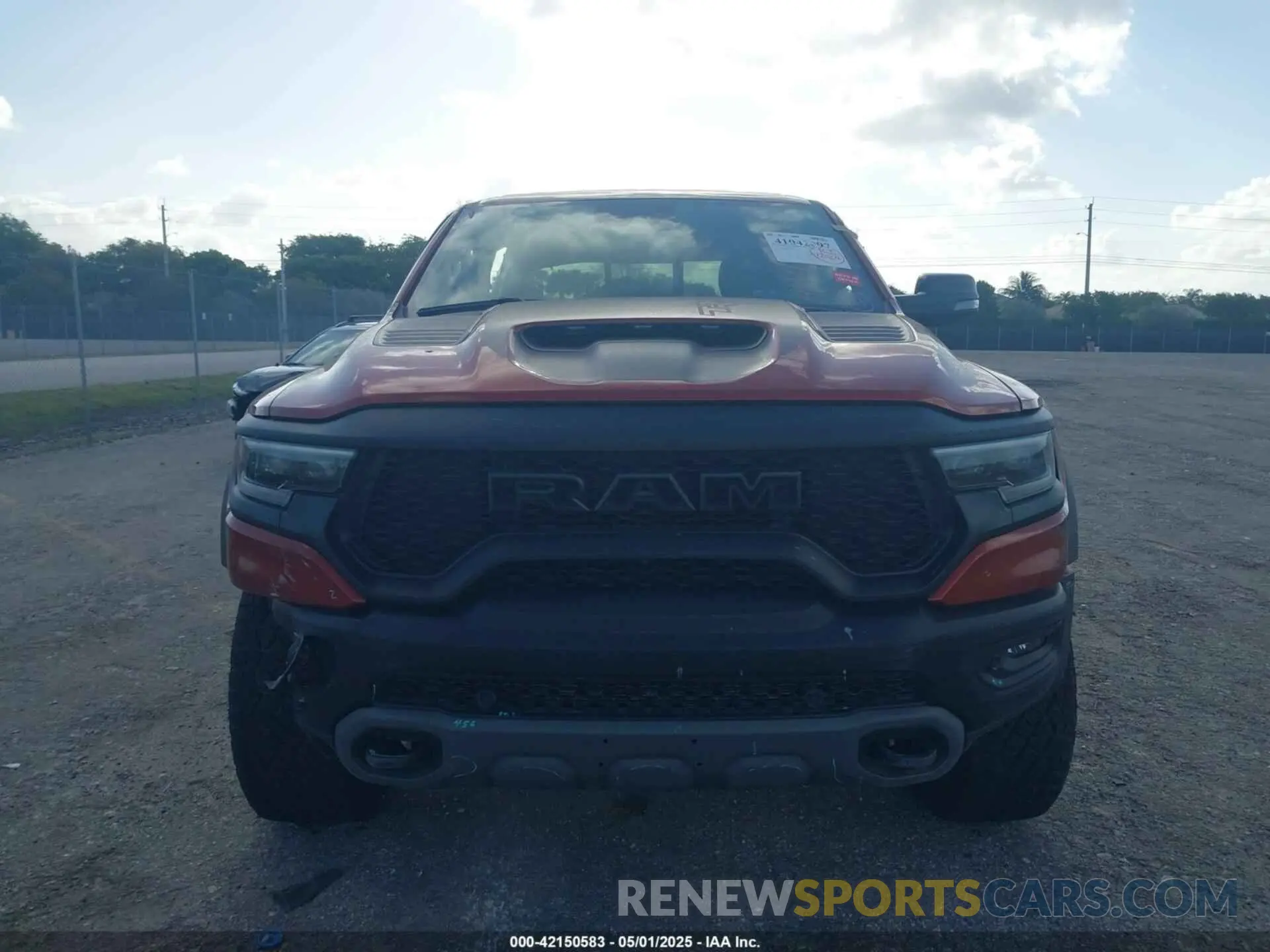 13 Photograph of a damaged car 1C6SRFU98RN223288 RAM 1500 2024