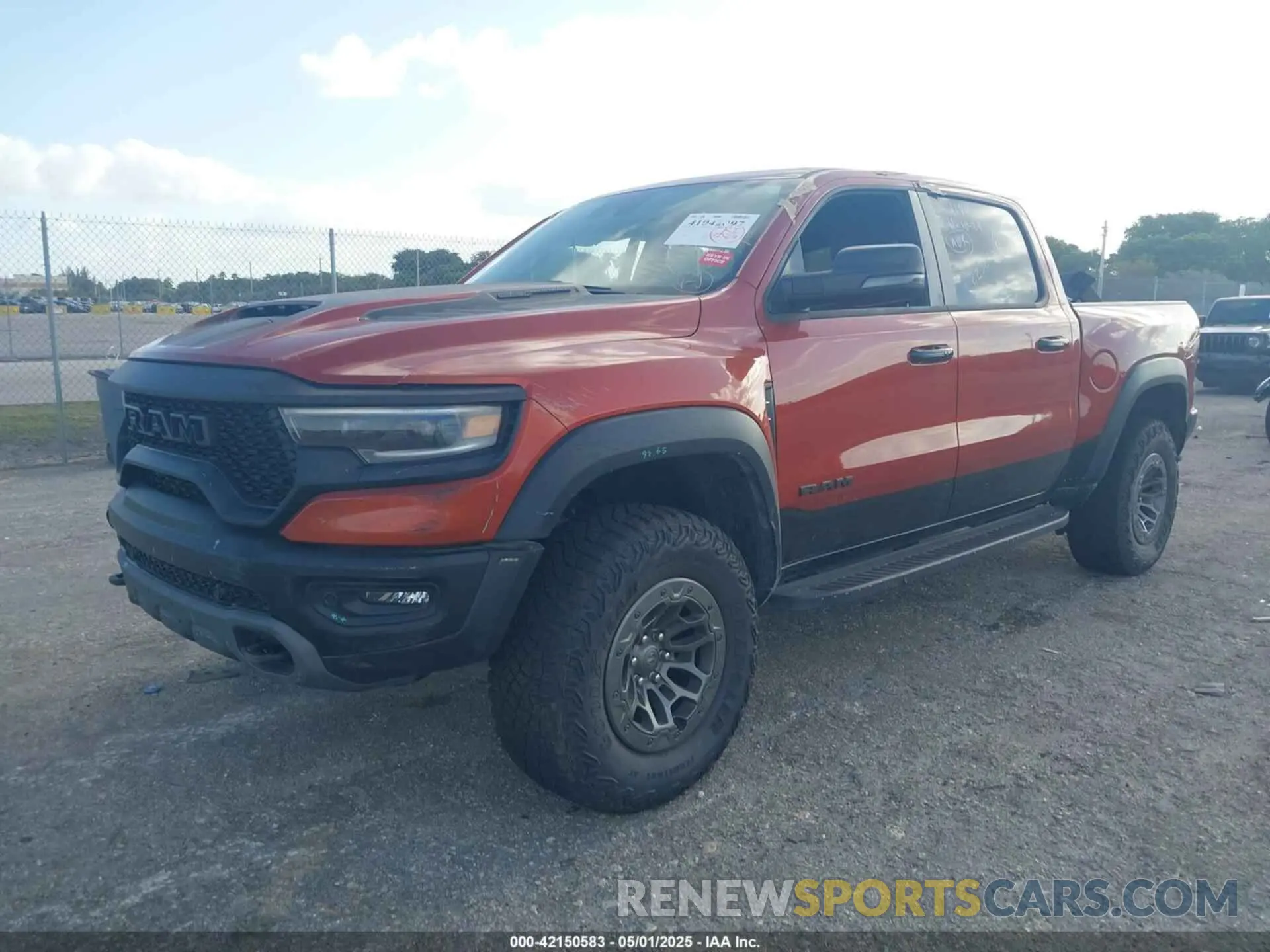 2 Photograph of a damaged car 1C6SRFU98RN223288 RAM 1500 2024