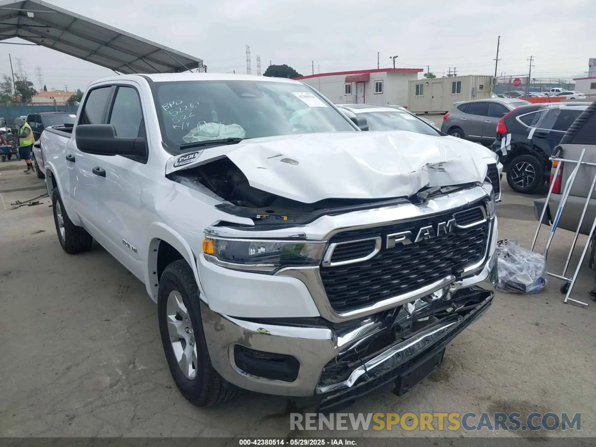 1 Photograph of a damaged car 1C6RREFG1SN504598 RAM 1500 2025