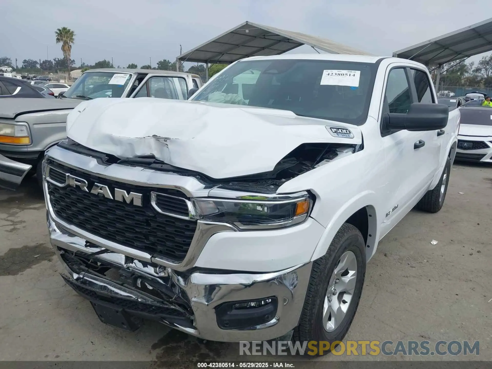 2 Photograph of a damaged car 1C6RREFG1SN504598 RAM 1500 2025