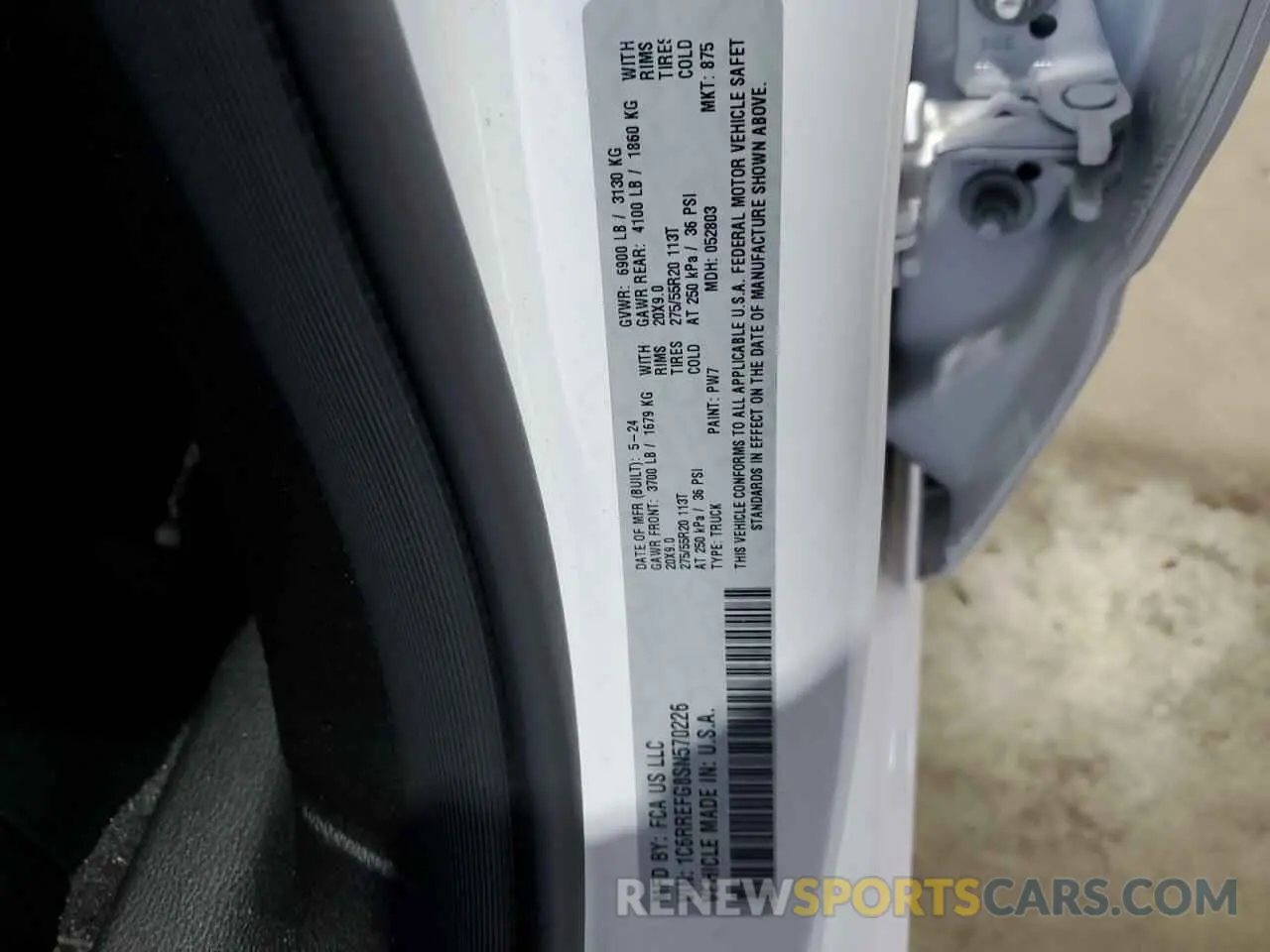 13 Photograph of a damaged car 1C6RREFG8SN570226 RAM 1500 2025