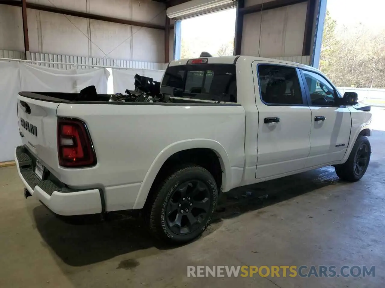 3 Photograph of a damaged car 1C6RREFG8SN570226 RAM 1500 2025
