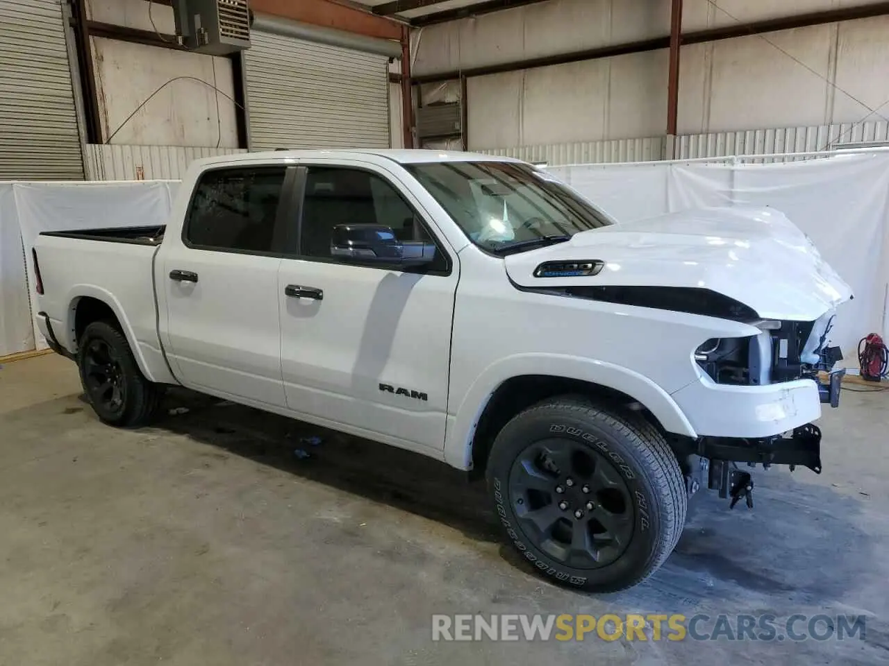 4 Photograph of a damaged car 1C6RREFG8SN570226 RAM 1500 2025