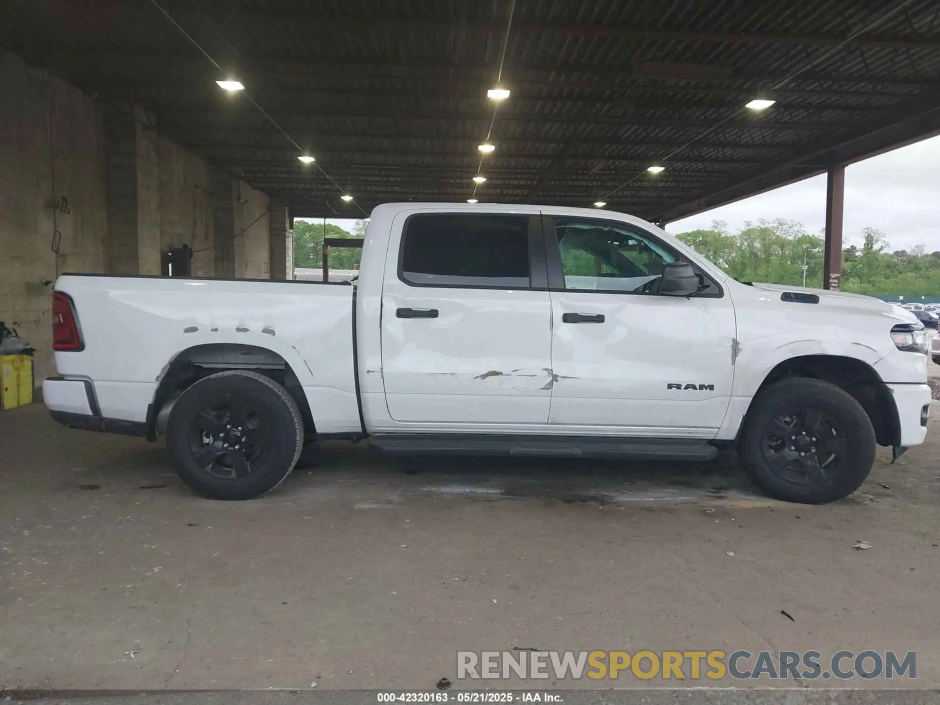 13 Photograph of a damaged car 1C6RRFGG2SN666762 RAM 1500 2025