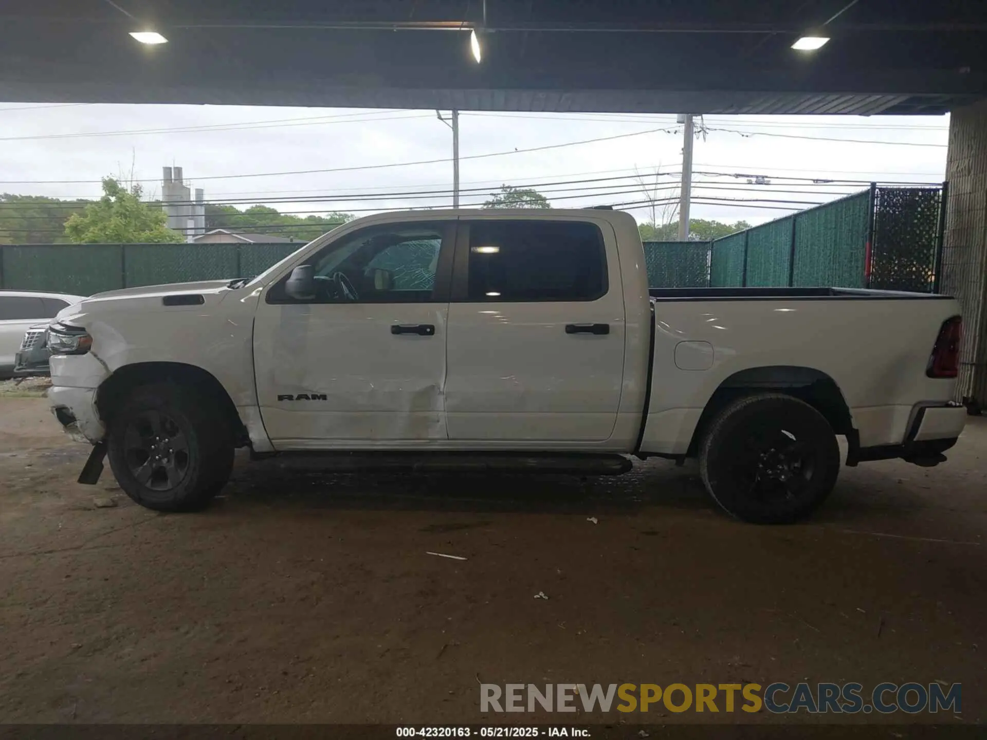 14 Photograph of a damaged car 1C6RRFGG2SN666762 RAM 1500 2025