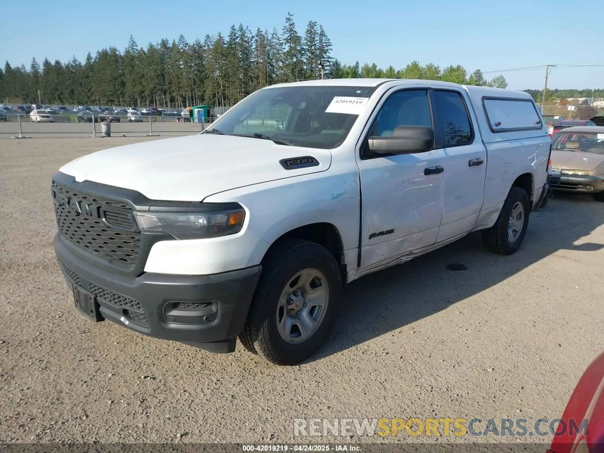 2 Photograph of a damaged car 1C6SRECG3SN543246 RAM 1500 2025