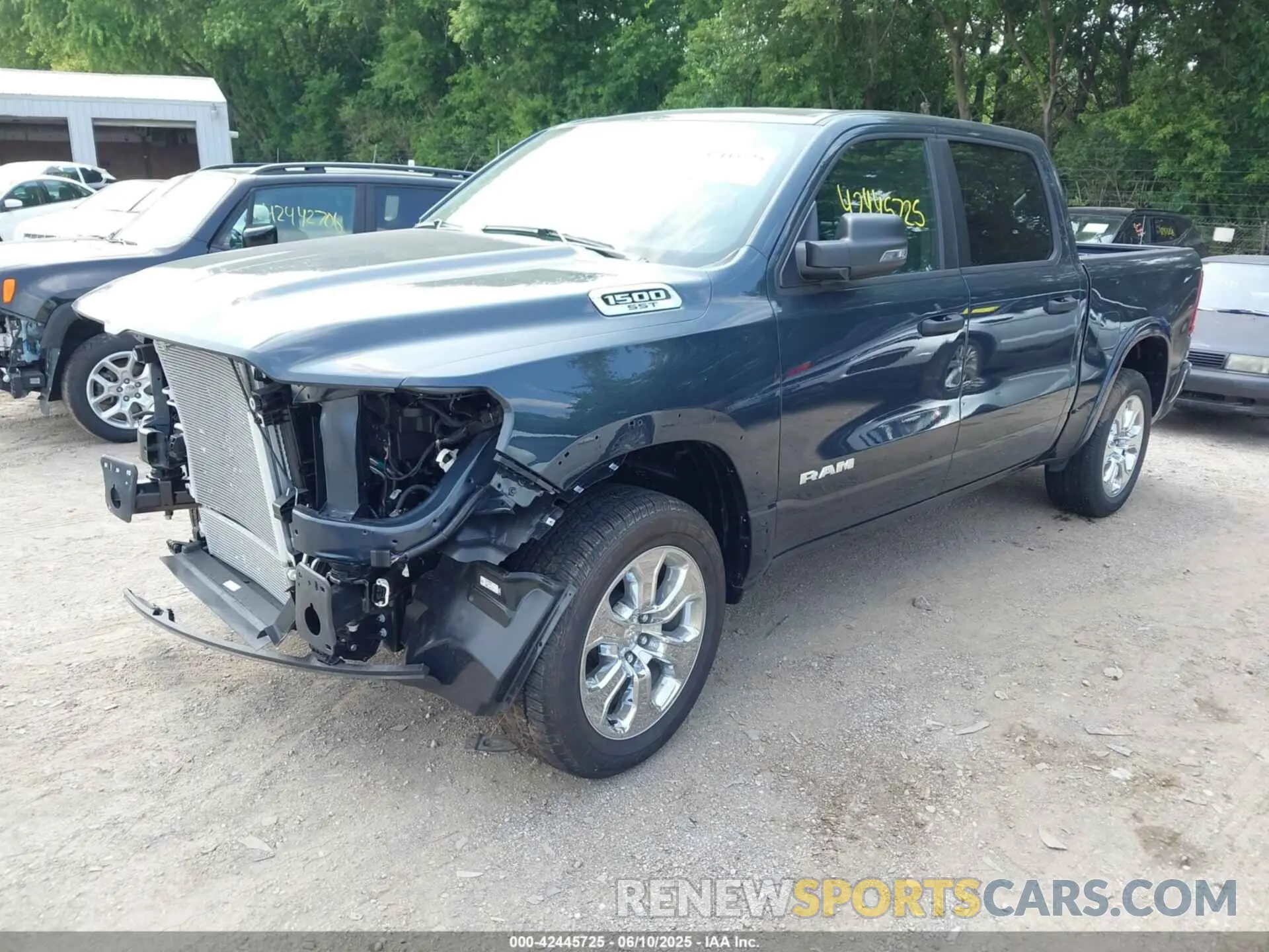 2 Photograph of a damaged car 1C6SRFFP2SN715400 RAM 1500 2025
