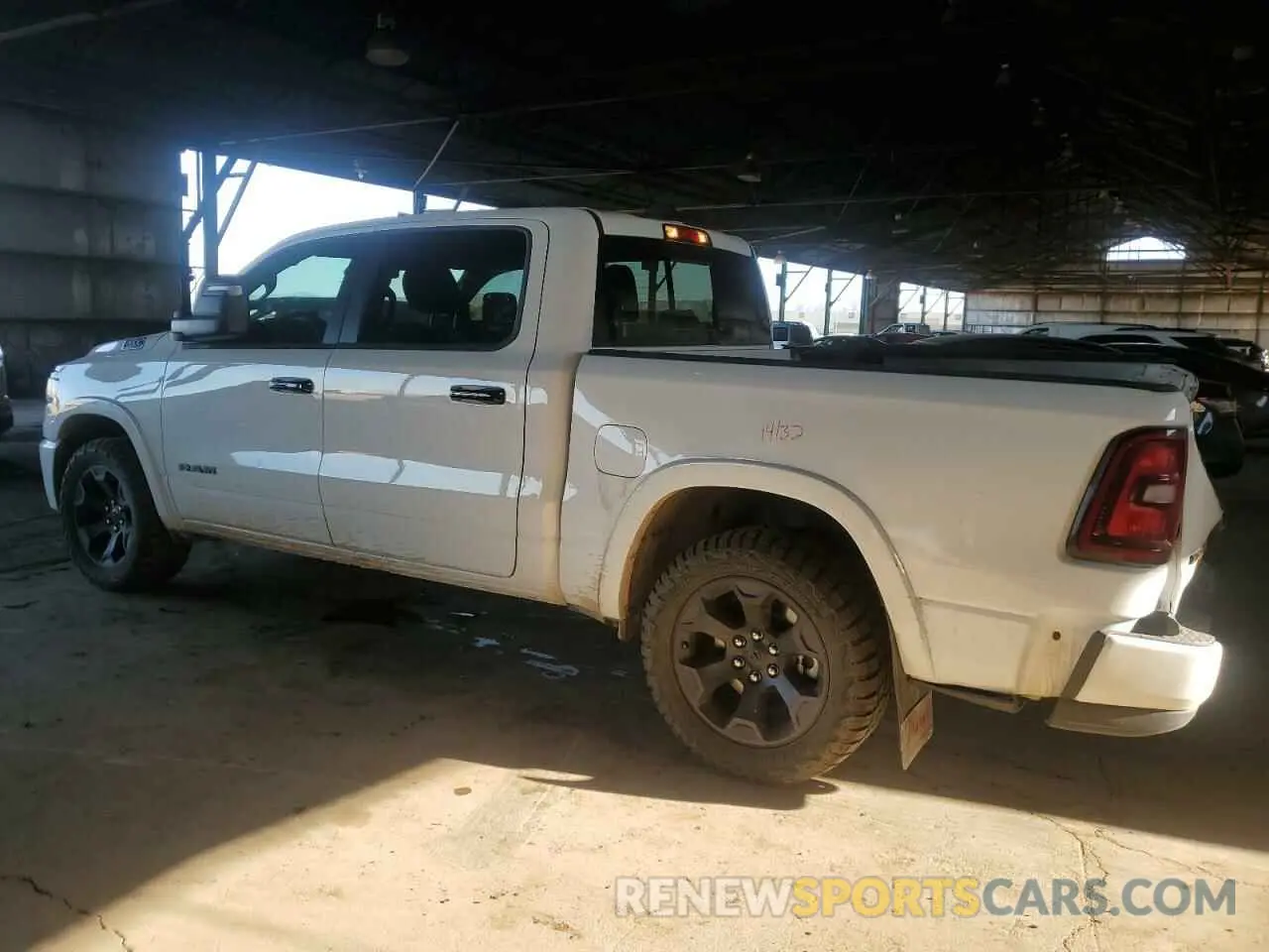 2 Photograph of a damaged car 1C6SRFFP8SN618833 RAM 1500 2025