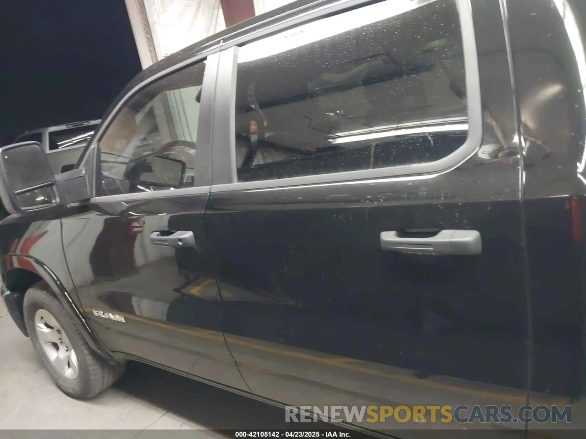 14 Photograph of a damaged car 1C6SRFFPXSN551670 RAM 1500 2025