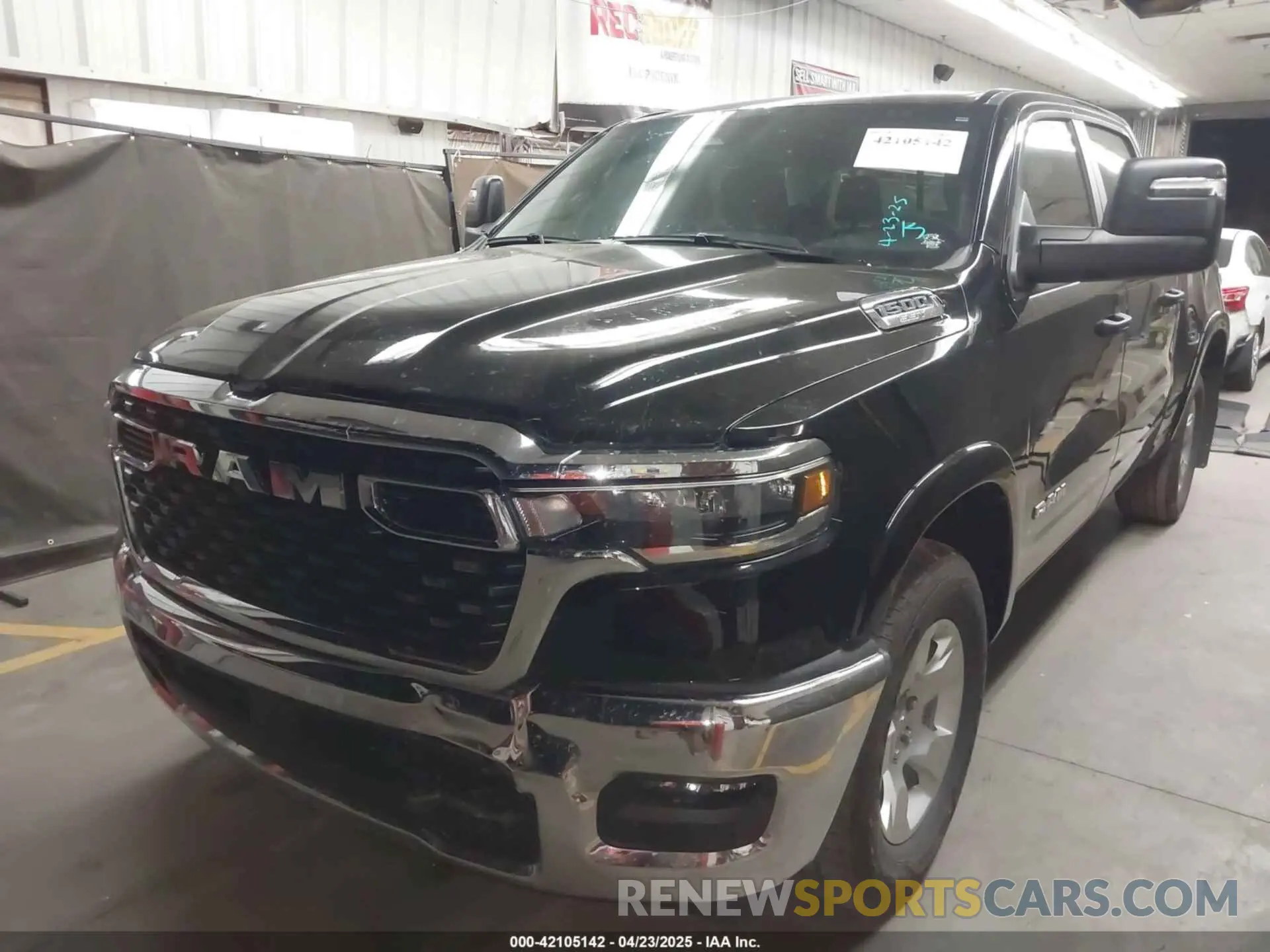 2 Photograph of a damaged car 1C6SRFFPXSN551670 RAM 1500 2025
