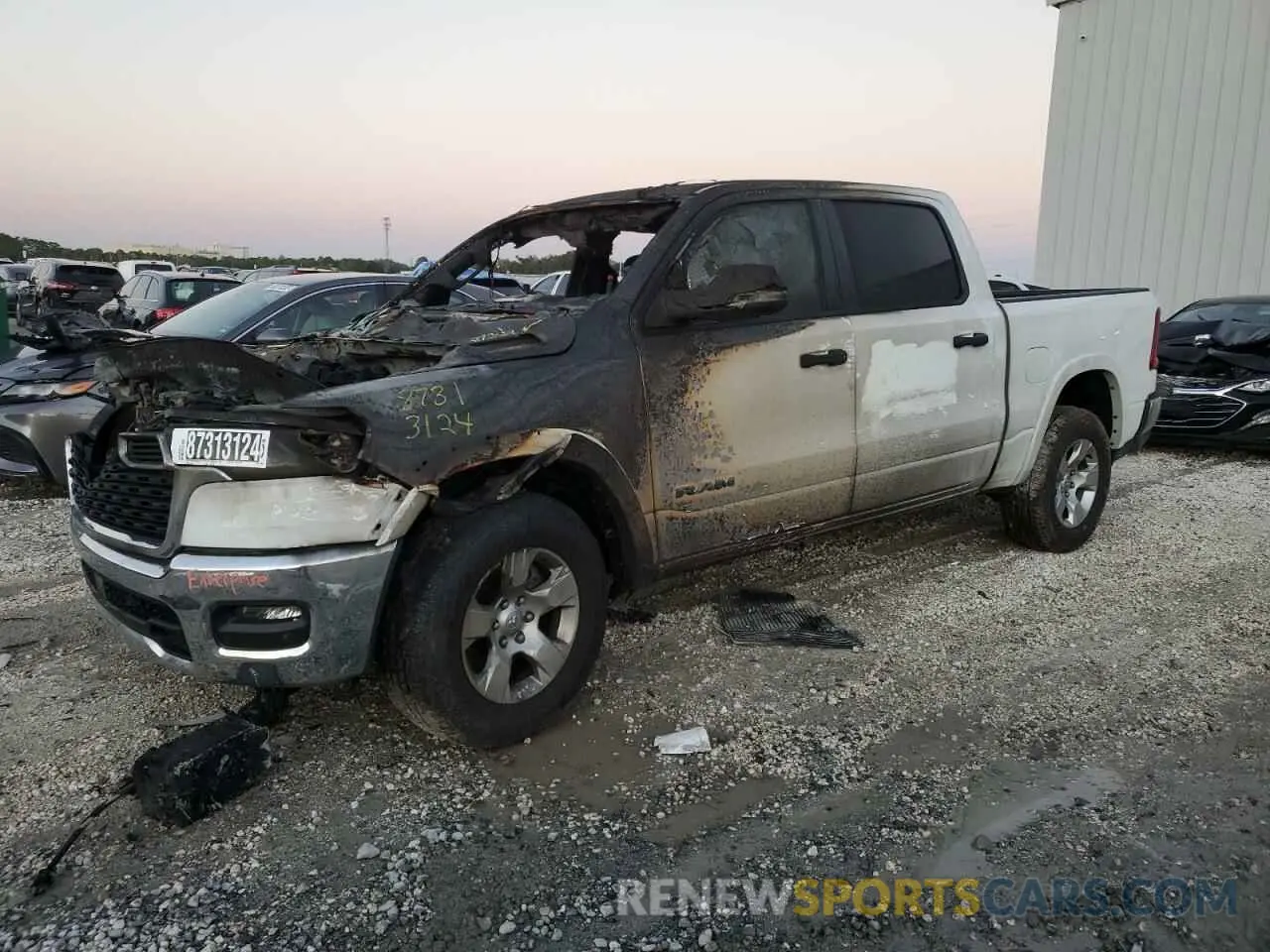 1 Photograph of a damaged car 1C6SRFFPXSN583907 RAM 1500 2025