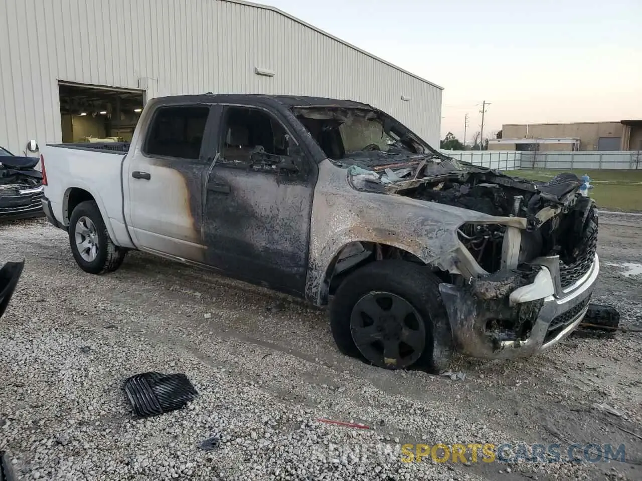 4 Photograph of a damaged car 1C6SRFFPXSN583907 RAM 1500 2025