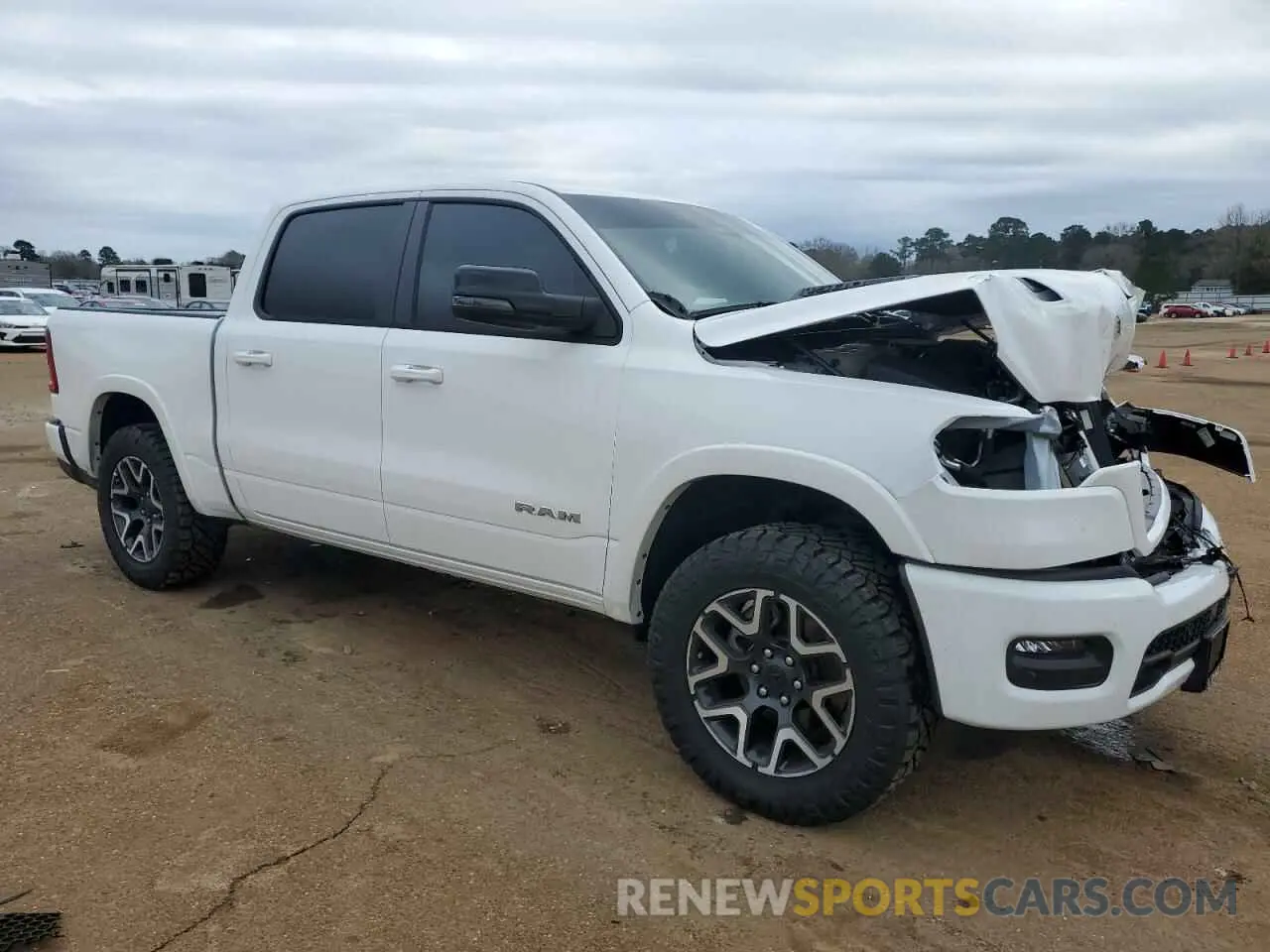4 Photograph of a damaged car 1C6SRFJP3SN554093 RAM 1500 2025