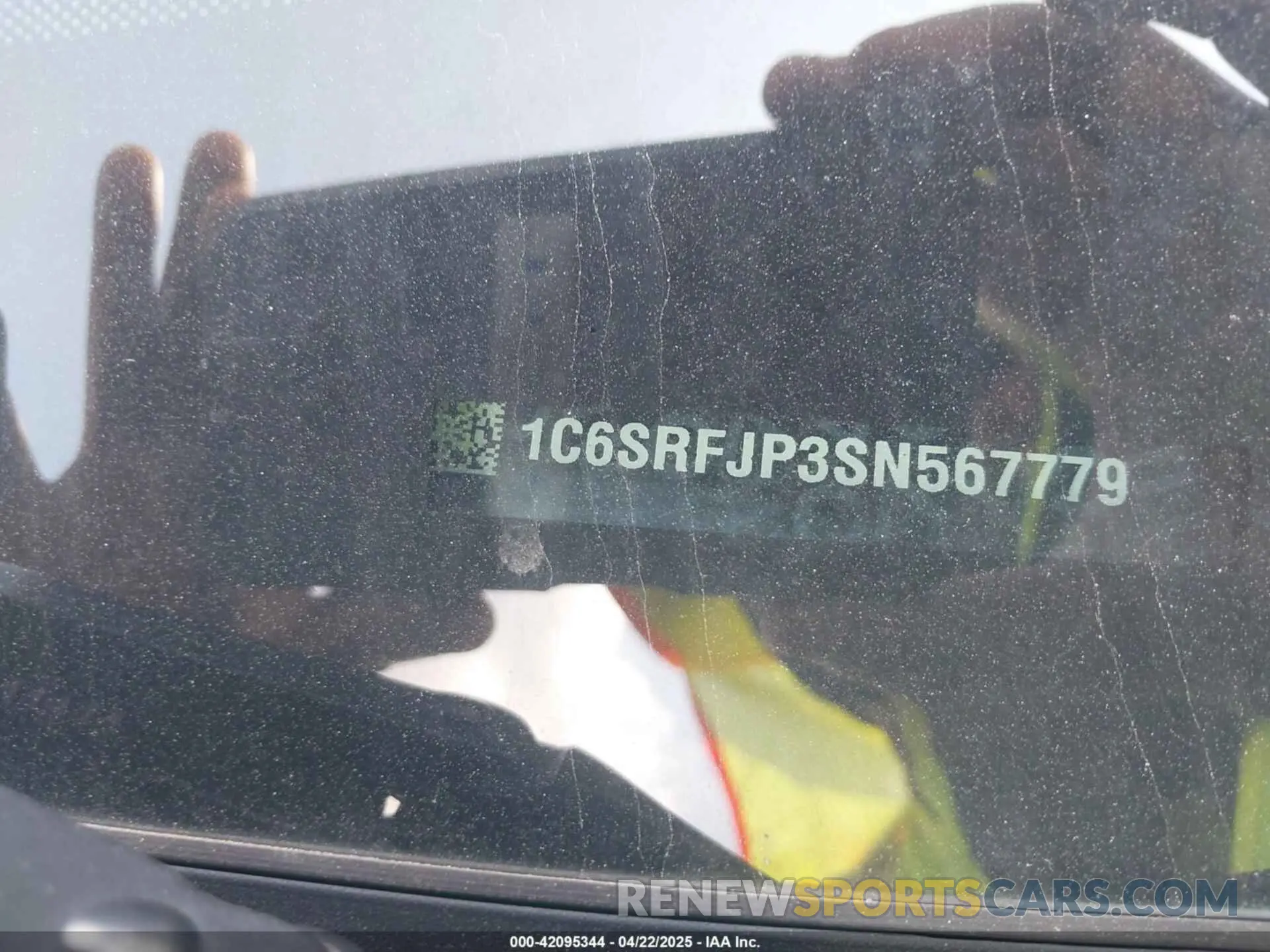 9 Photograph of a damaged car 1C6SRFJP3SN567779 RAM 1500 2025