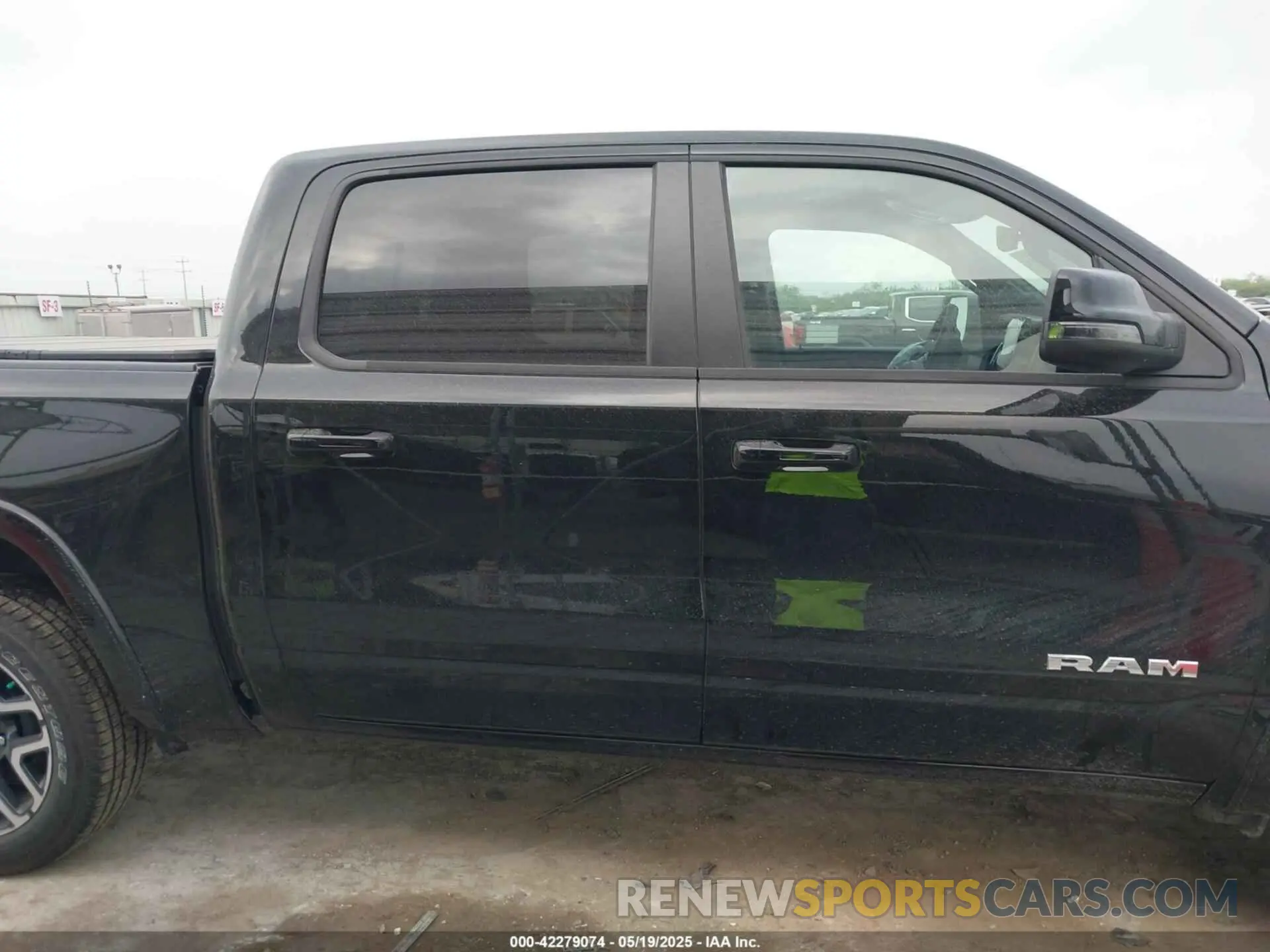 14 Photograph of a damaged car 1C6SRFJP7SN502028 RAM 1500 2025
