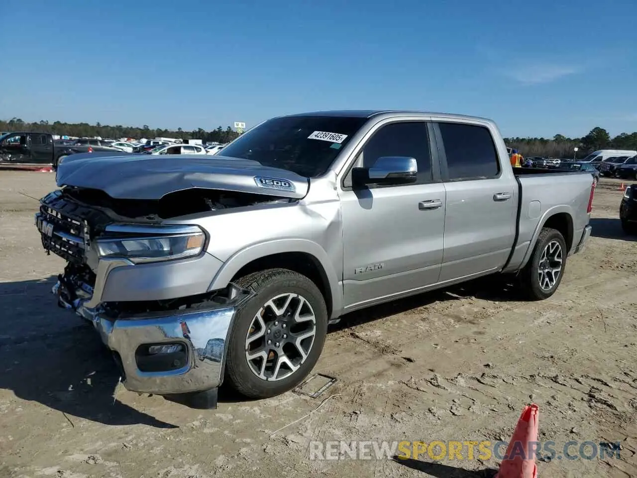 1 Photograph of a damaged car 1C6SRFJP9SN563221 RAM 1500 2025