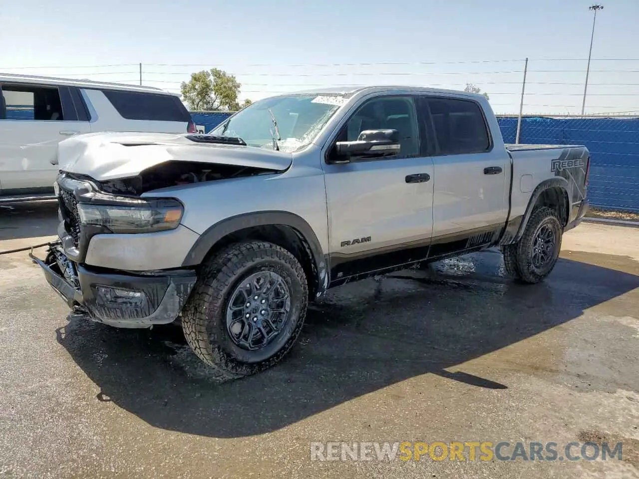 1 Photograph of a damaged car 1C6SRFLP0SN570460 RAM 1500 2025