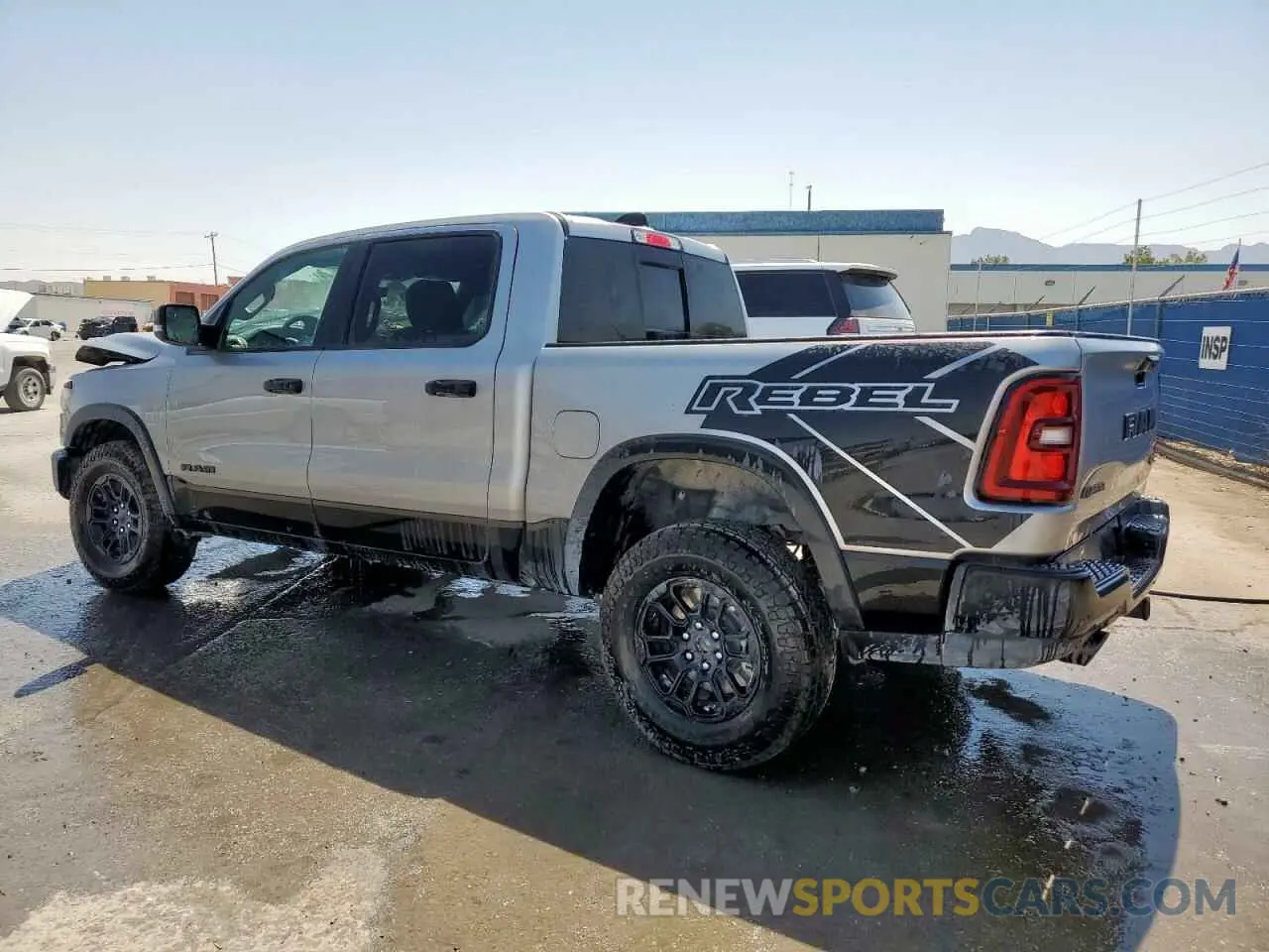 2 Photograph of a damaged car 1C6SRFLP0SN570460 RAM 1500 2025