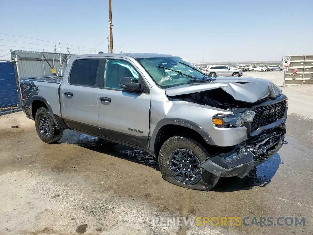 4 Photograph of a damaged car 1C6SRFLP0SN570460 RAM 1500 2025